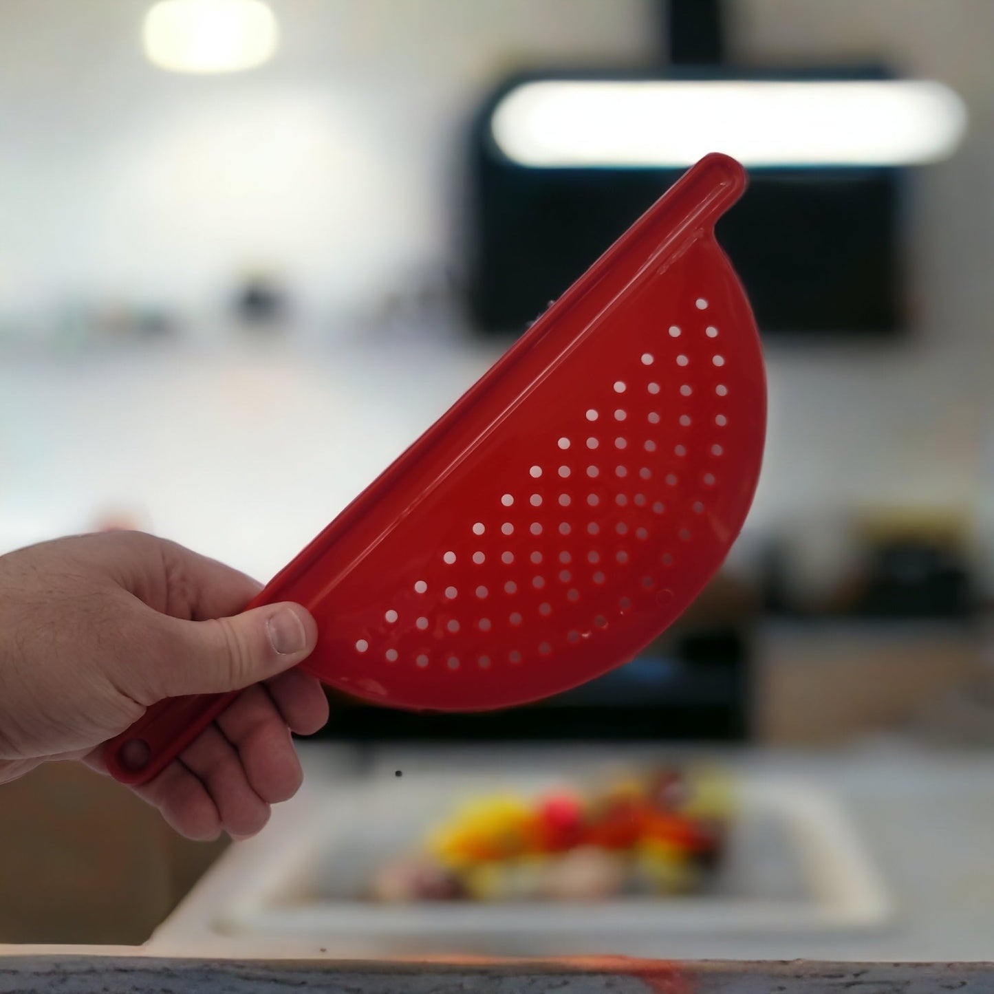 Handy Housewares Handheld Plastic Pot Drainer, Noodle & Pasta Strainer with Handle - Fits up to 9" Pots - Red