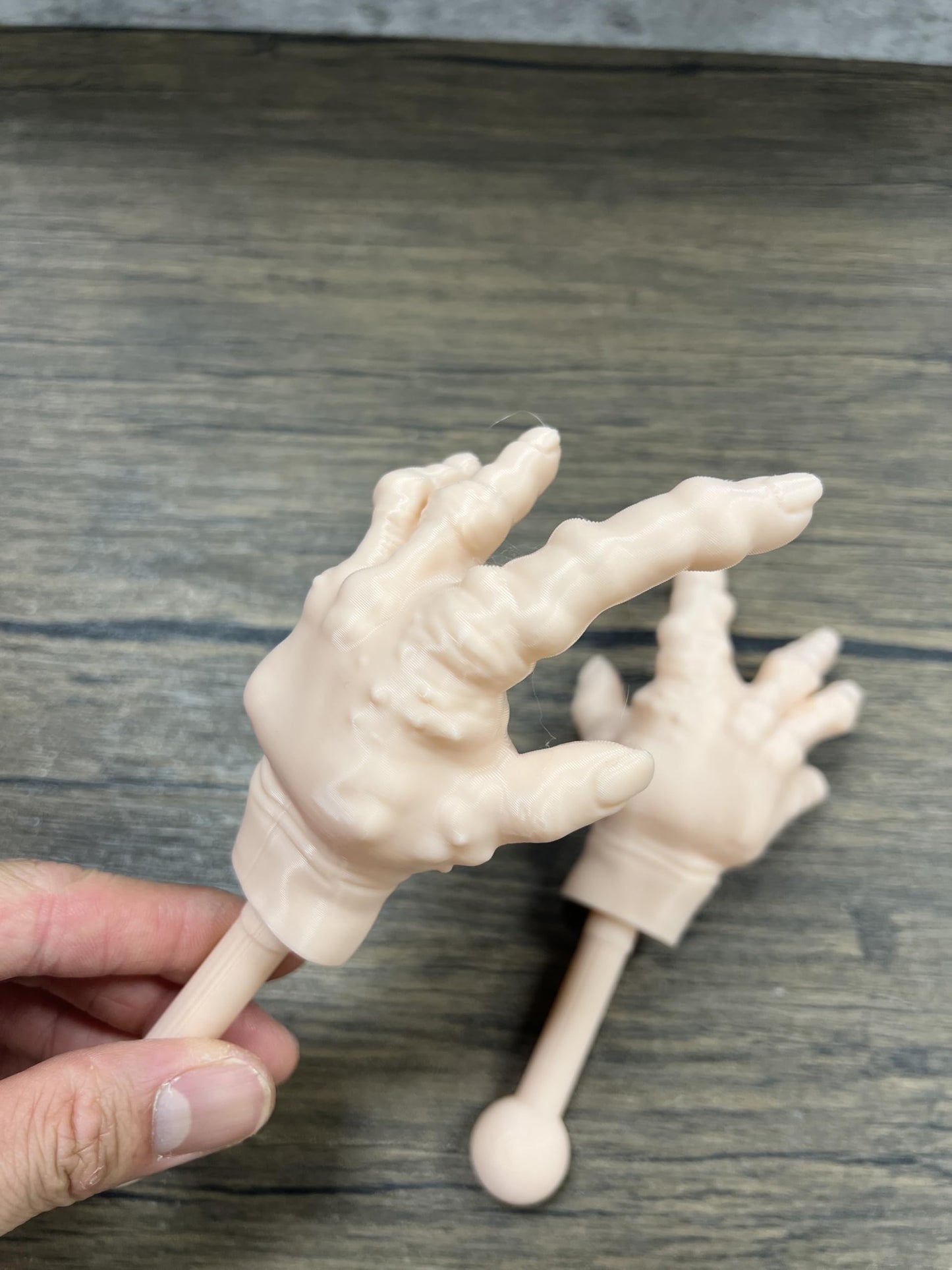 Munnygrubbers - 1 Pair Tiny Hands with Sticks - Mini Little Hand Stick Puppet - Halloween Costume - Strong Hand Prop - Scary Movies - Novelty Gift - TikTok Famous - (Creepy 1x Set)