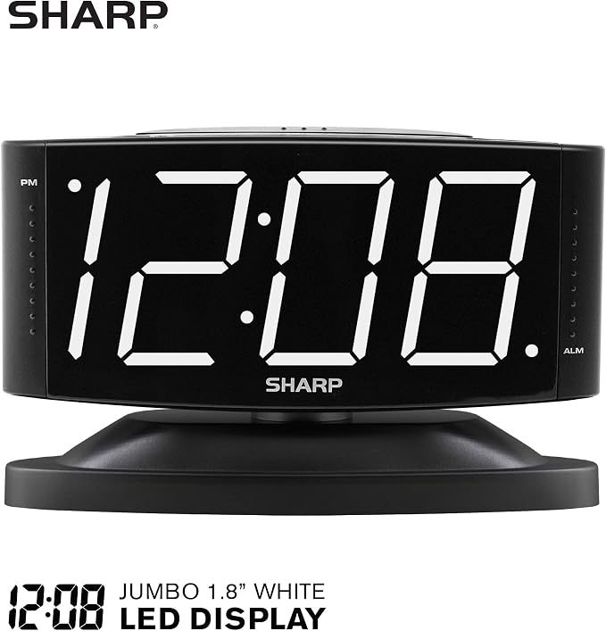 Sharp Digital Alarm Clock with Swivel Base, White LED, Dimmer, Black | Large white LED digits; Adjustable swivel base; Brightness dimmer; Snooze alarm; Simple controls; black case