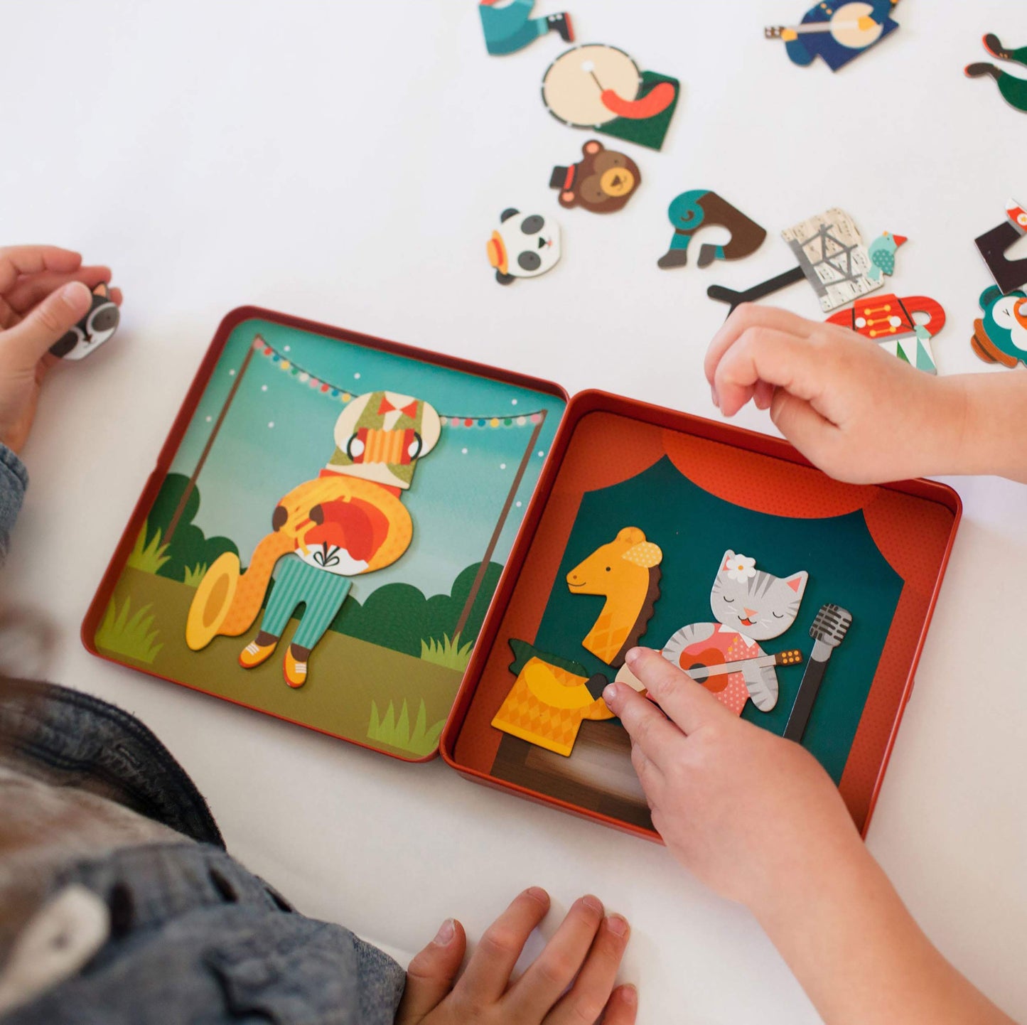 Petit Collage Magnetic Play Set, Animal Band – Mix & Match Magnetic Game Board, Ideal for Ages 3+ – Includes 2 Magnetic Scenes and over 25 Magnet Pieces, Ideal Travel Activity for Kids
