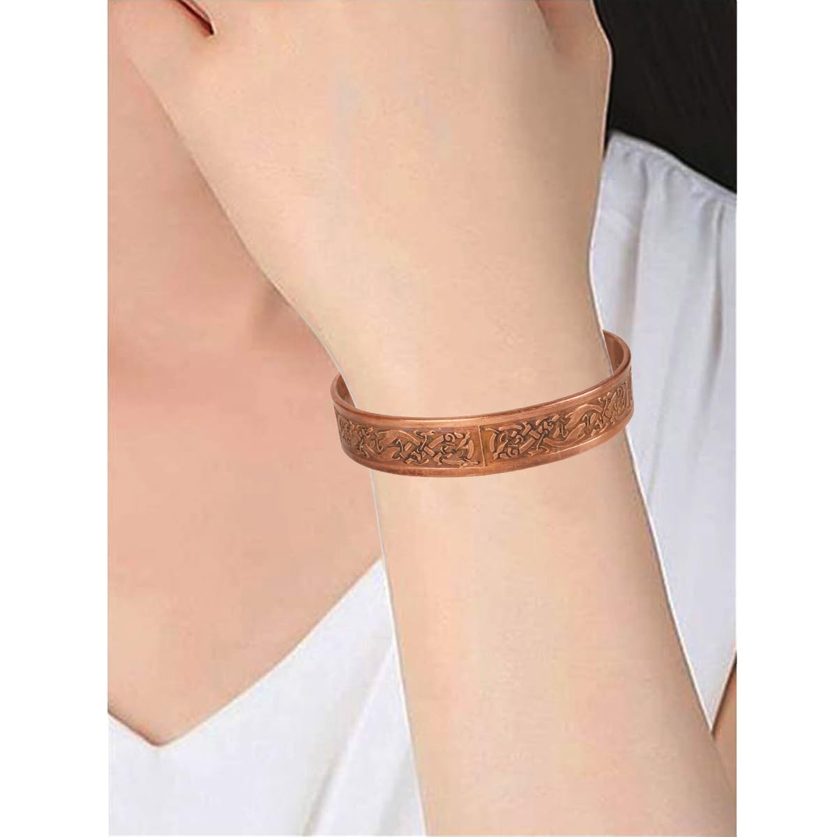 Touchstone handcrafted magnetic copper bracelet. Hand forged with solid and high gauge Tibetan style engraved cuff pure copper jewelry for women men. Exclusive Celtic Design.