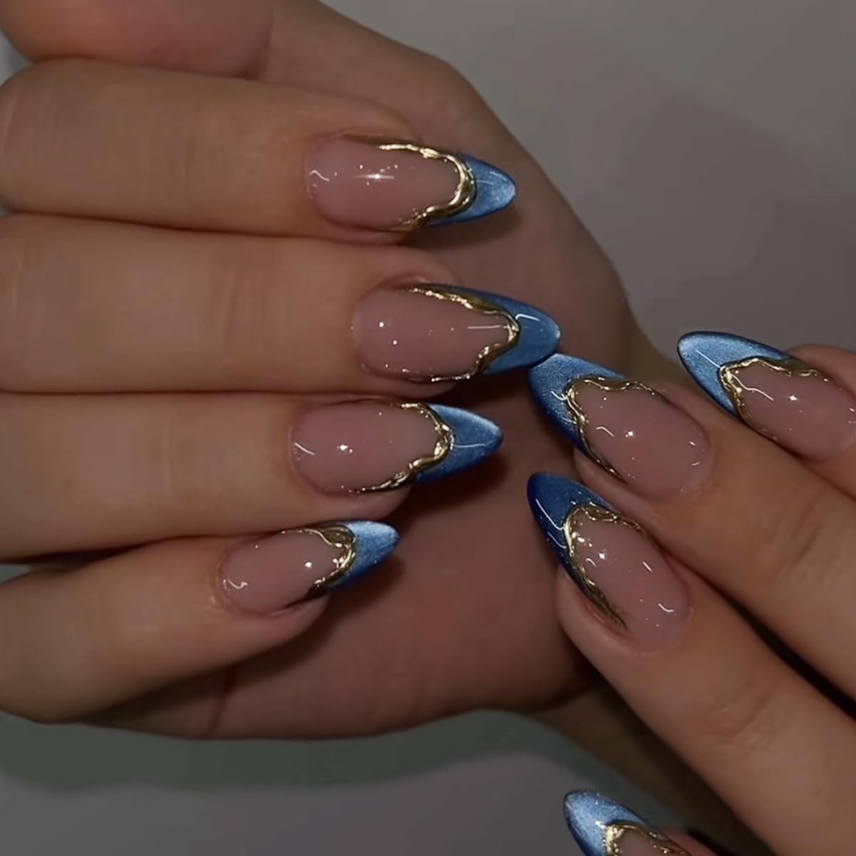 Blue French Tip Press on Nails Medium Almond Cat Eyes Fake Nails with Gold Curve Line Designs Blue False Nails Acrylic Artificial Spring Summer Stick on Nails for Women DIY French Manicure Kit