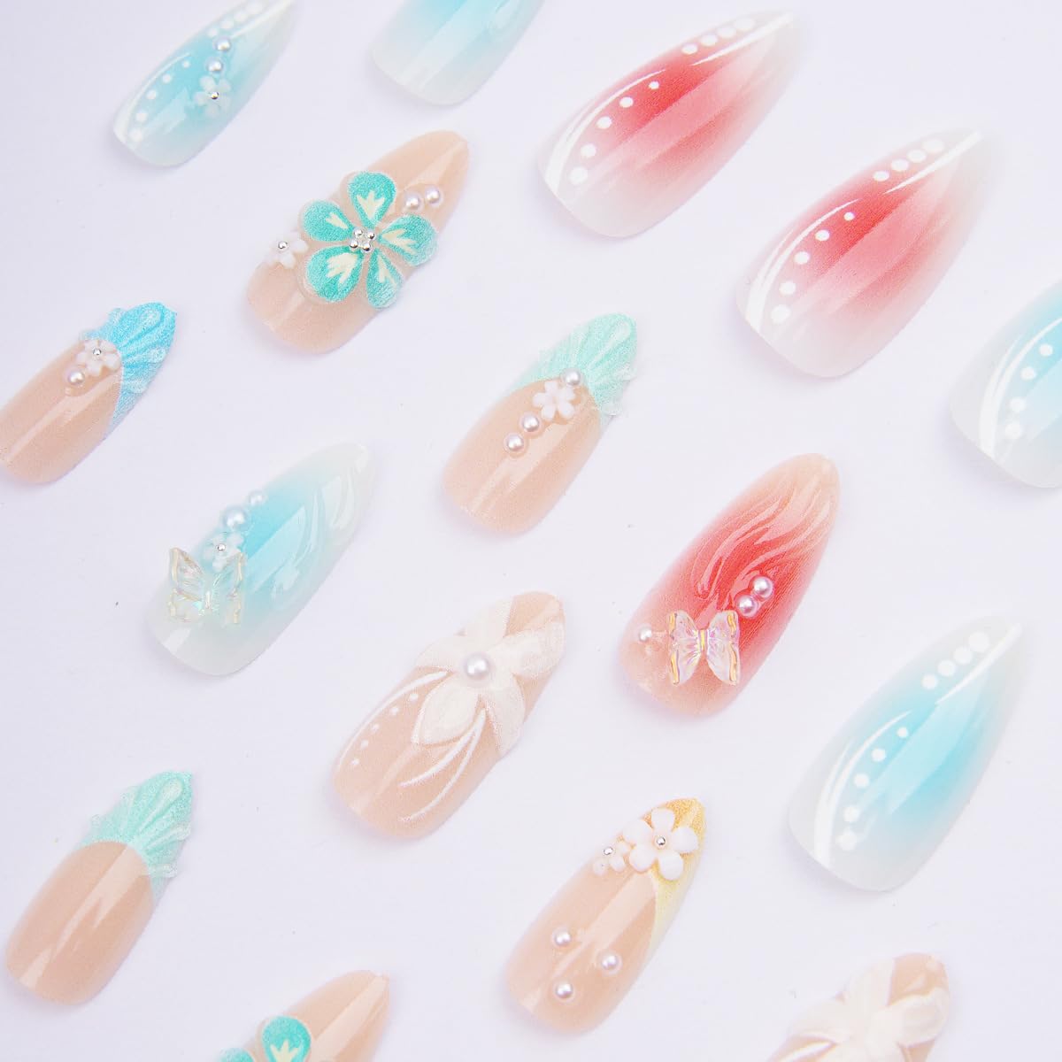 24Pcs Summer Press on Nails Medium Almond Fake Nails French Tip False Nails with Flower Butterfly Design Glossy Blue Gradient Acrylic Nails Beach Stick on Nails 3D Water Ripple Glue on Nails for Women