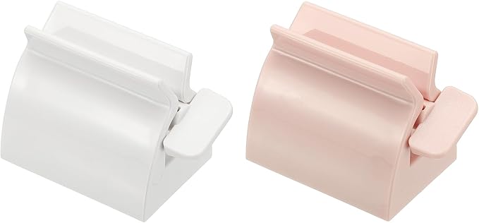 uxcell Toothpaste Tube Squeezer, 2Pcs 2.3" Toothpaste Squeezer Dispenser Rollers Tube Squeezers Clip Holder Stand for Bathroom, White/Pink