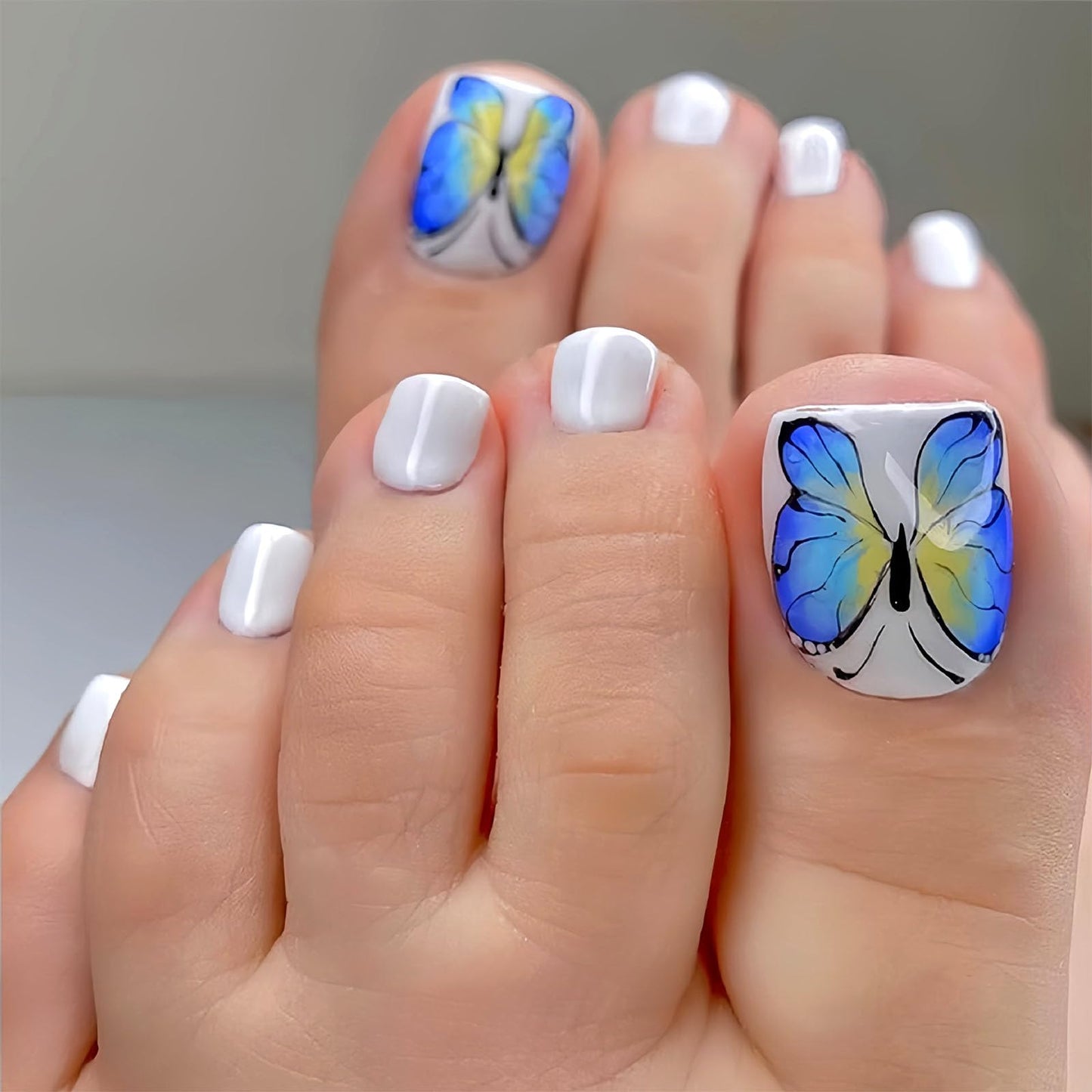 Spring Press on Toenails White Fake Toe nails with Blue Butterfly Design Glossy Short Square Toe nails Press ons Acrylic Stick on Toenails for Women 24Pcs