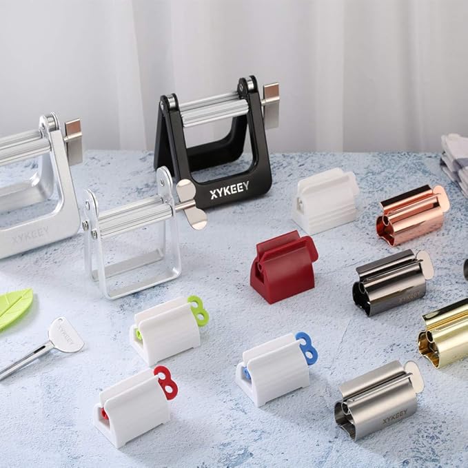 XYKEEY Toothpaste Tube Squeezer - Set of 2 Toothpaste Squeezer Rollers, Metal Toothpaste Tube Wringer Seat Holder Stand (Gold)