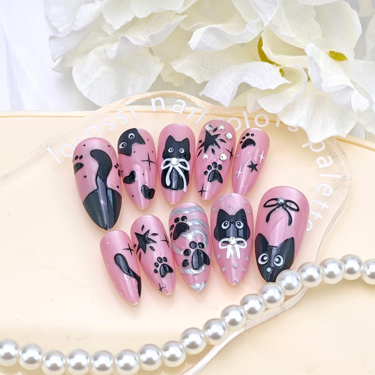 24Pcs Pink Press on Nails Medium Almond Cute Cat Fake Nails with Black Cat Bow Pearl Design Glossy Full Cover Acrylic Glue on Nail Silver Heart False Nails Artificial Reusable Stick on Nail for Women
