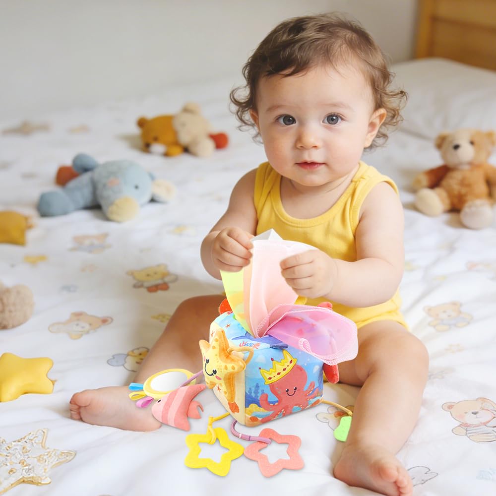 Caterbee Baby Sensory Tissue Box Toy with Hanging Hook – Pull Out Fabric Tissues, Rattle & Teether, Montessori Stroller & Car Seat Toy for Infants (Ocean)