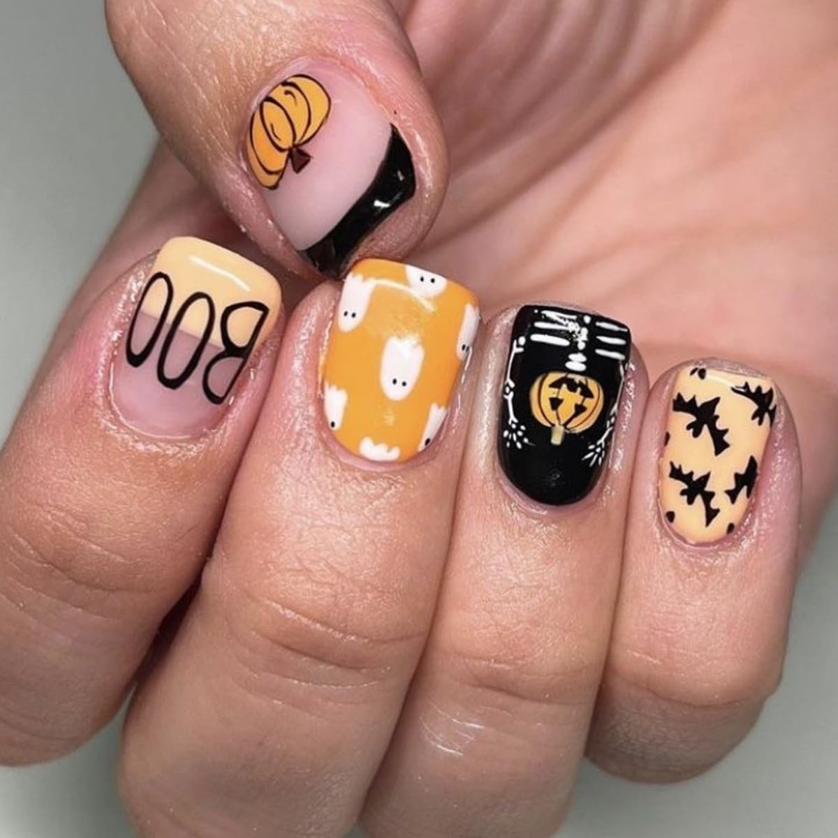 Halloween Press on Nails Short Square Fake Nails with Pumpkin Ghost Bat Skeleton Design Stick on Nails Black French Tip False Nails Artificial Full Cover Acrylic Glue on Nail for Women Manicure 24Pcs