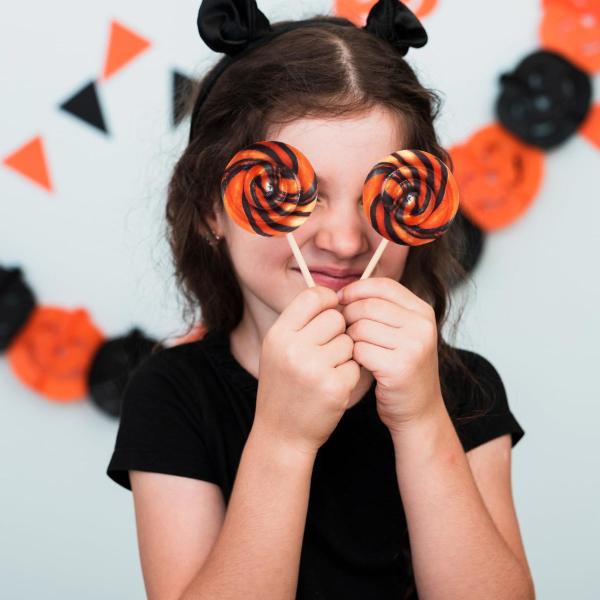 Halloween Lollipops, 24 Pieces of Halloween Candy Individually Wrapped, Perfect Suckers for Kids and Families, Swirly Trick or Treat Lollipop Design for Extra Fun