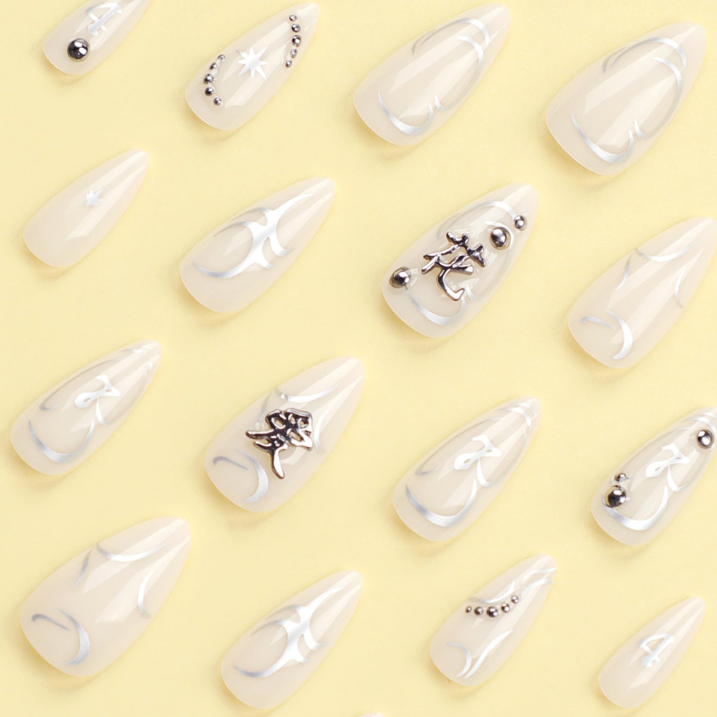 IMSOHOT Almond Press on Nails Medium Fake Nails White Glossy Acrylic False Nails with Metal Charms Designs Full Cover Silver Flame Stiletto UV Artificial Nails for Women and Girls