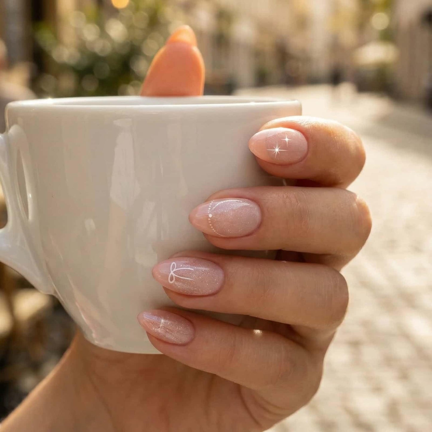 French Press on Nails Short Almond Fake Nails Pink with Bow Starlight Designs Full Cover Acrylic Glue on Nails Removable Artificial Stick on Nails for Women 24 Pcs