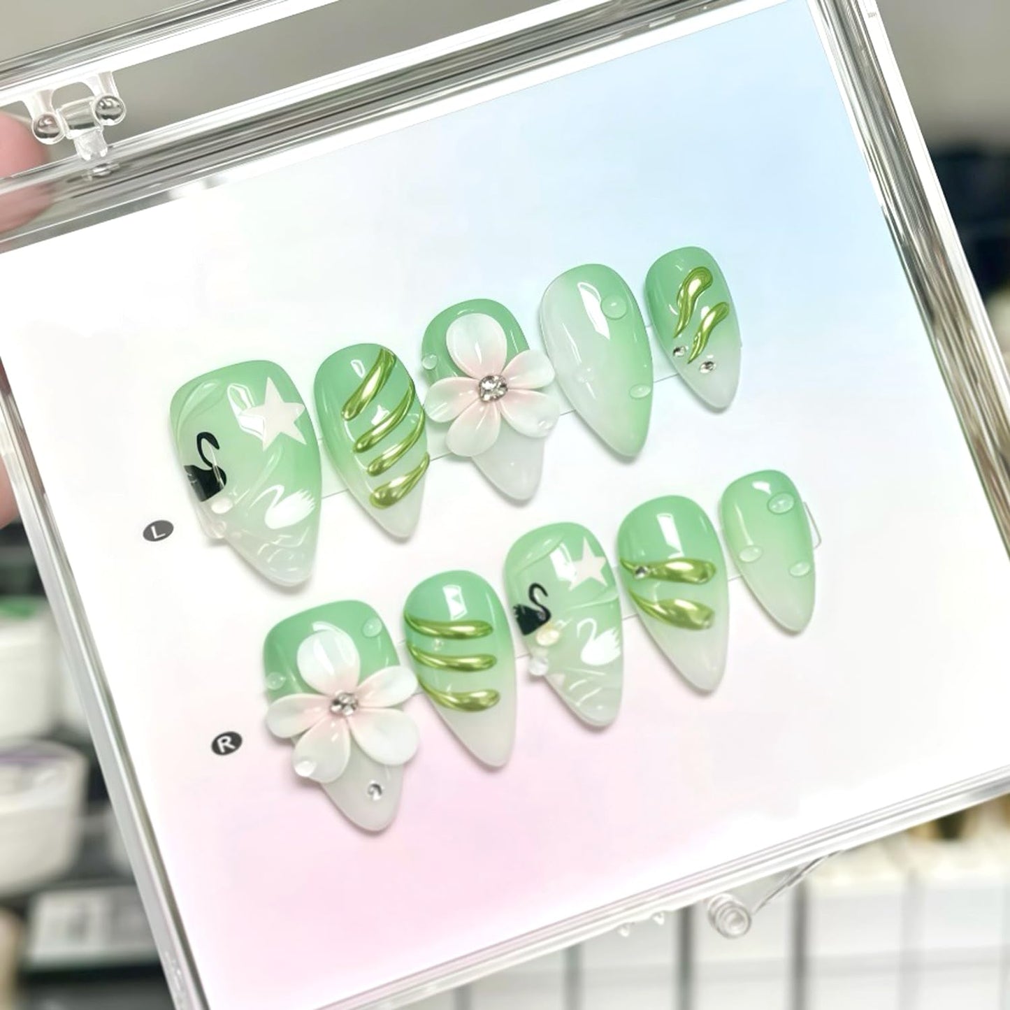 30Pcs Y2K Green Press on Nails Almond Fake Nails with 3D Flower Rhinestones and Black White Swan Design Green Gradient Spring False Nails Gold Lines Full Cover Handmade Stick on Nail for Women