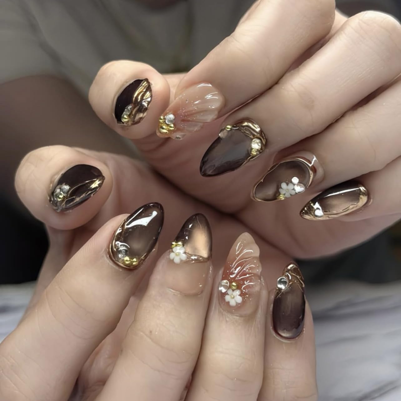 plalely Almond Press on Nails Short Brown Fake Nail Gold Embossed Acrylic Nail Press ons Daisy Charm Stick on Nail for Women 24pcs
