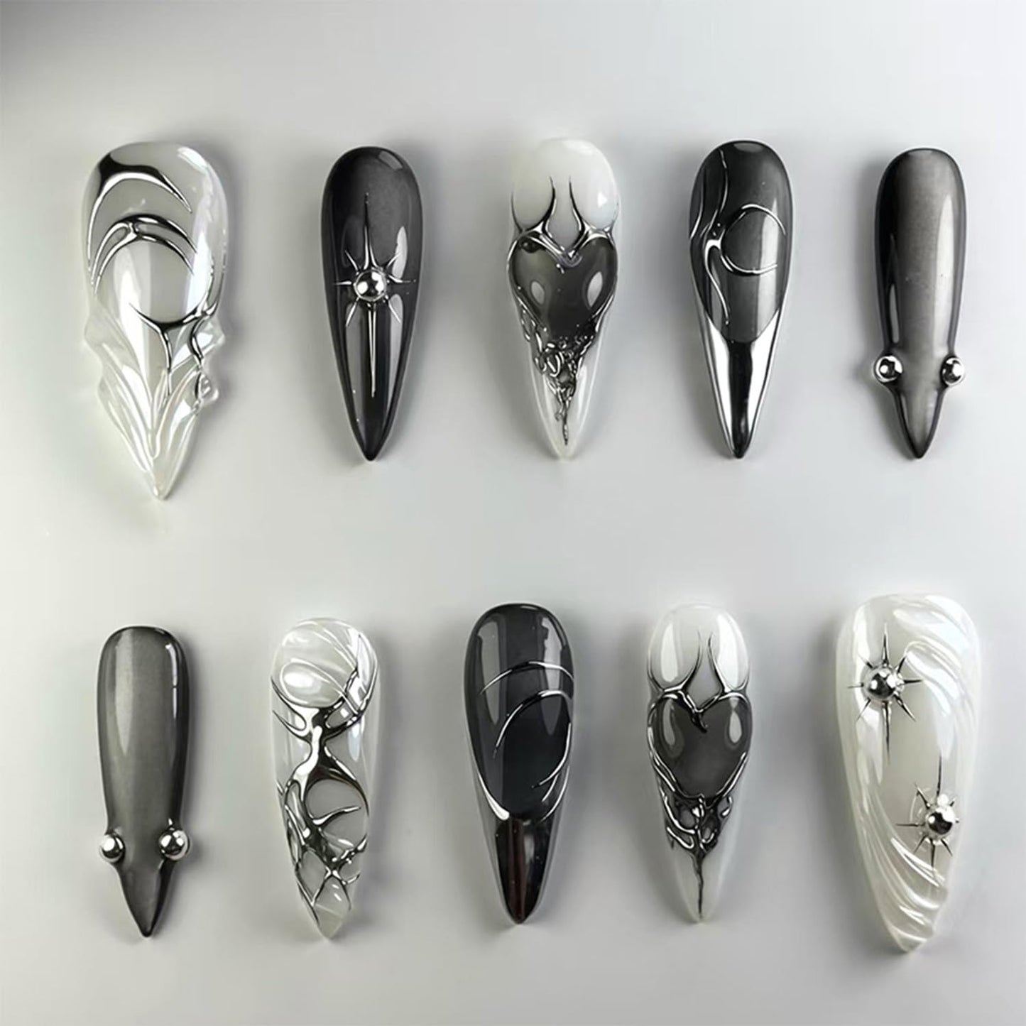 24Pcs Black Press on Nails Medium Almond Fake Nails with Silver Star Heart Rhinestones Designs Glossy Acrylic Full Cover Stick on Nail Gothic Dark Black Style False Nails for Women DIY Nails Salon