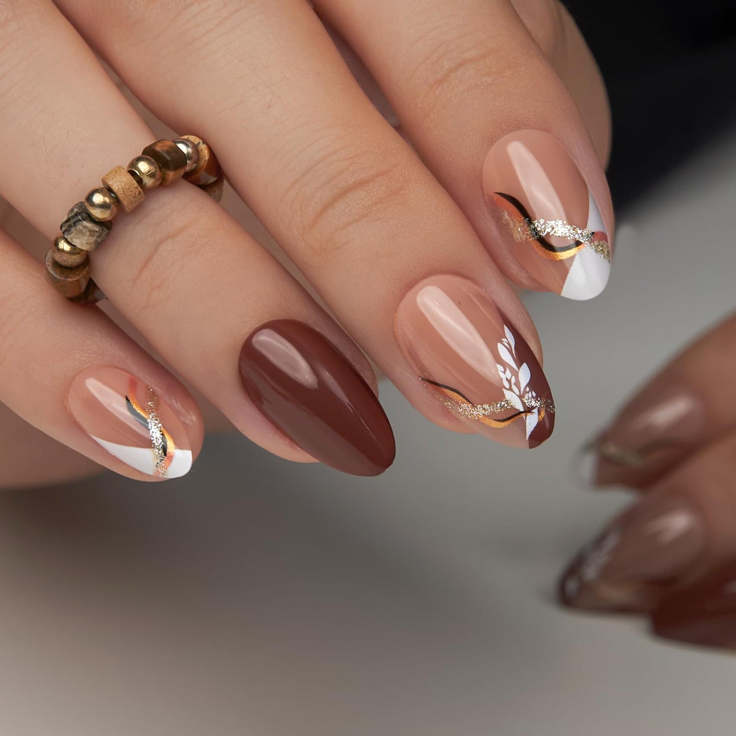 Curvlife Medium Press On Nails Kit - Full Cover False Almond Press on Nail Tips with Golden Line and Leaf Designs, Reusable & Glue Included - Easy Application Nail Accessories for Women
