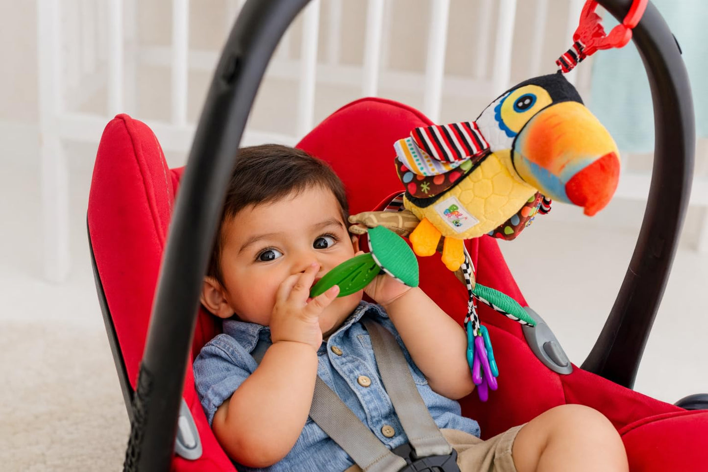 Balibazoo Toucan Hanging Baby Toy – Soft Plush Sensory Rattle with Crinkle Wings, Hidden Bell & BPA-Free Teether | Clip Attaches to Stroller, Car Seat, Gym | Developmental Toy for Babies 0-24M