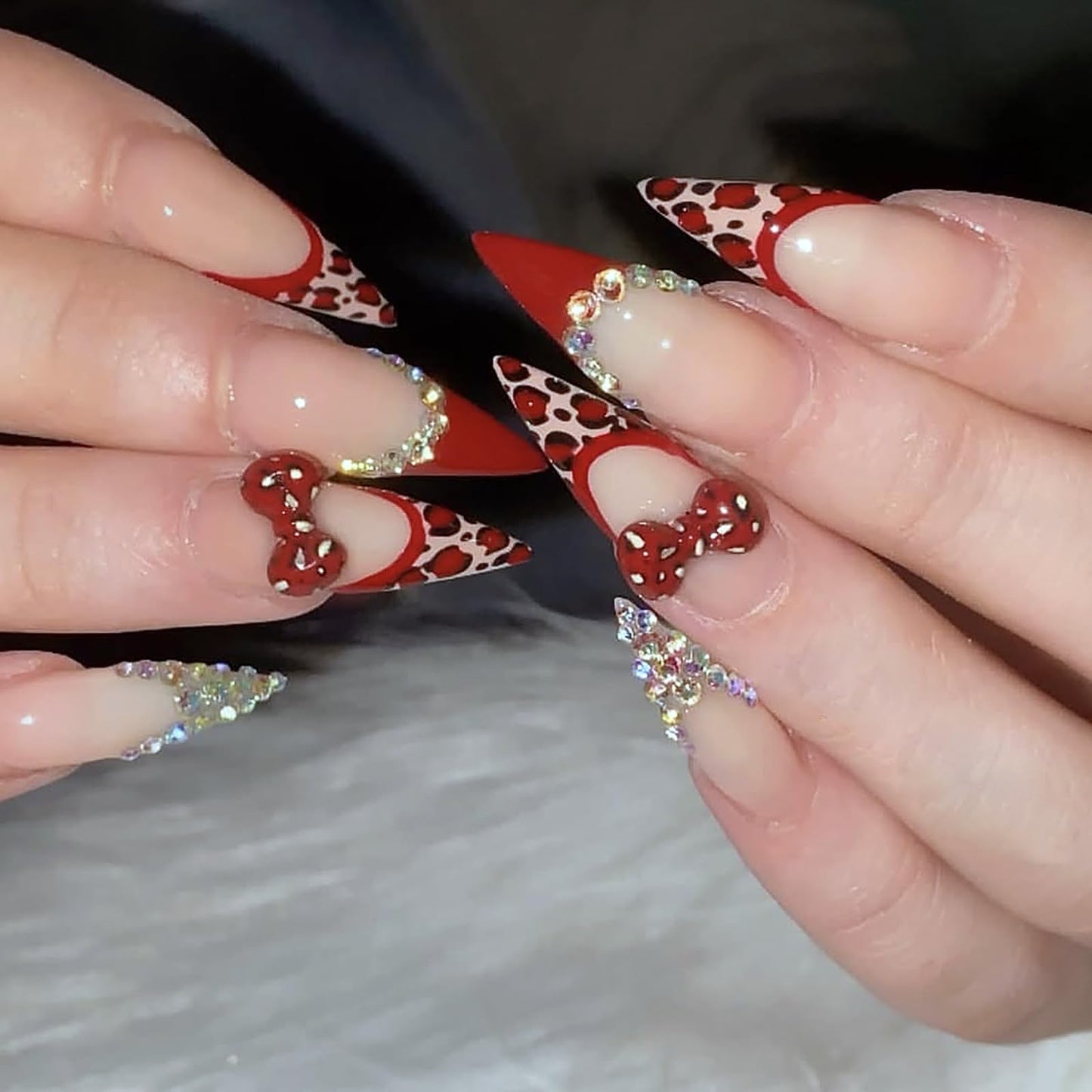 24Pcs Long Stiletto Press on Nails Red French Tip Fake Nails with 3D Bow Leopard Rhinestone Design Artificial False Nails Long Almond Nails Press ons Handmade Glue on Nail for Women Nail Decoration