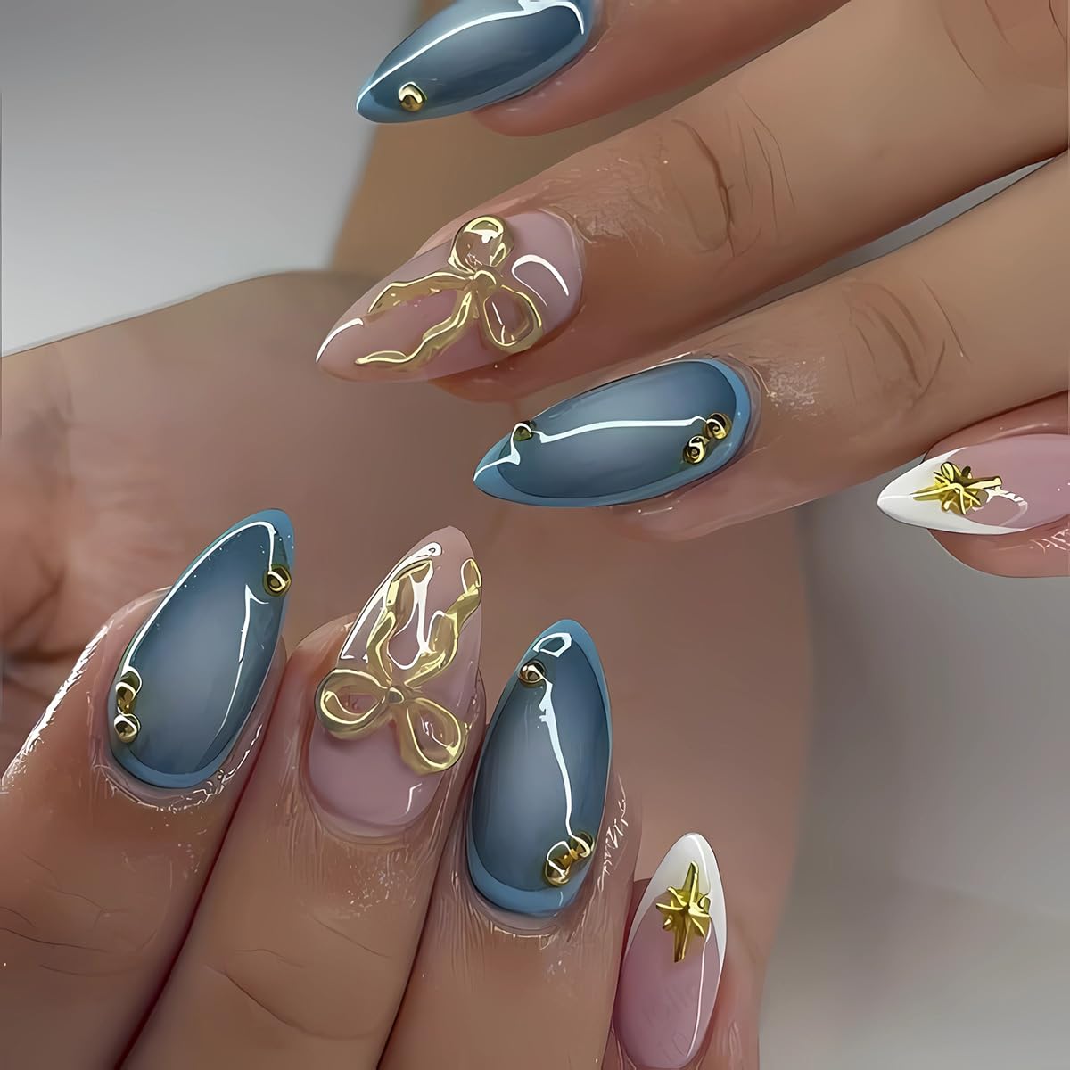 3D Gold Bow Press on Nails Glossy Blue Fake Nails Medium Almond False Nails with Star Design White French Tip Glue on Nails Full Cover Stick on Nails Cute Artificial Nails for Women Manicure 24Pcs