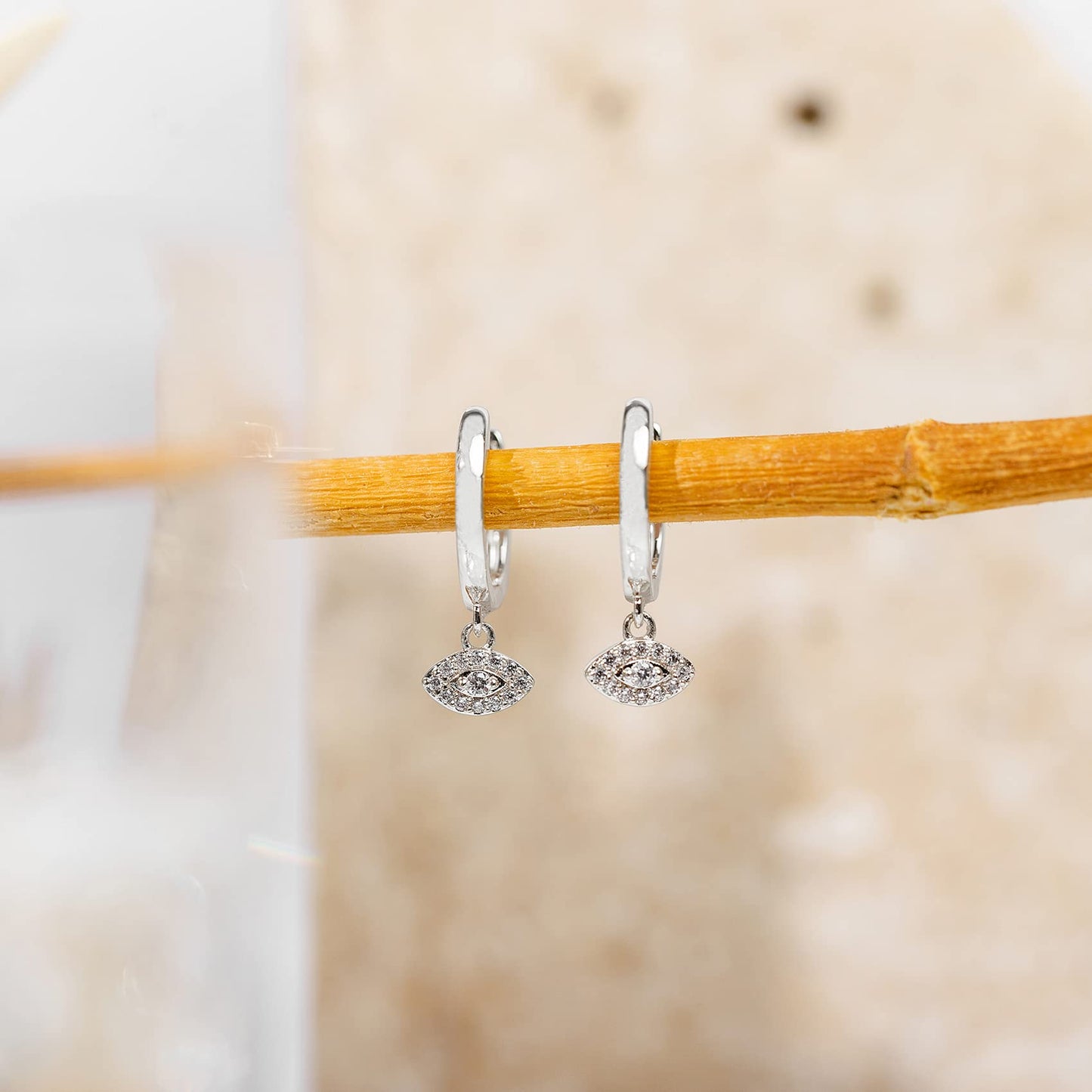 PAVOI Rhodium Plated 925 Sterling Silver Post Good Luck Dangle Huggie Hoop Earrings For Women - Trendy Evil Eye Drop Hoop Earrings - Cubic Zirconia Small Hinged Huggies