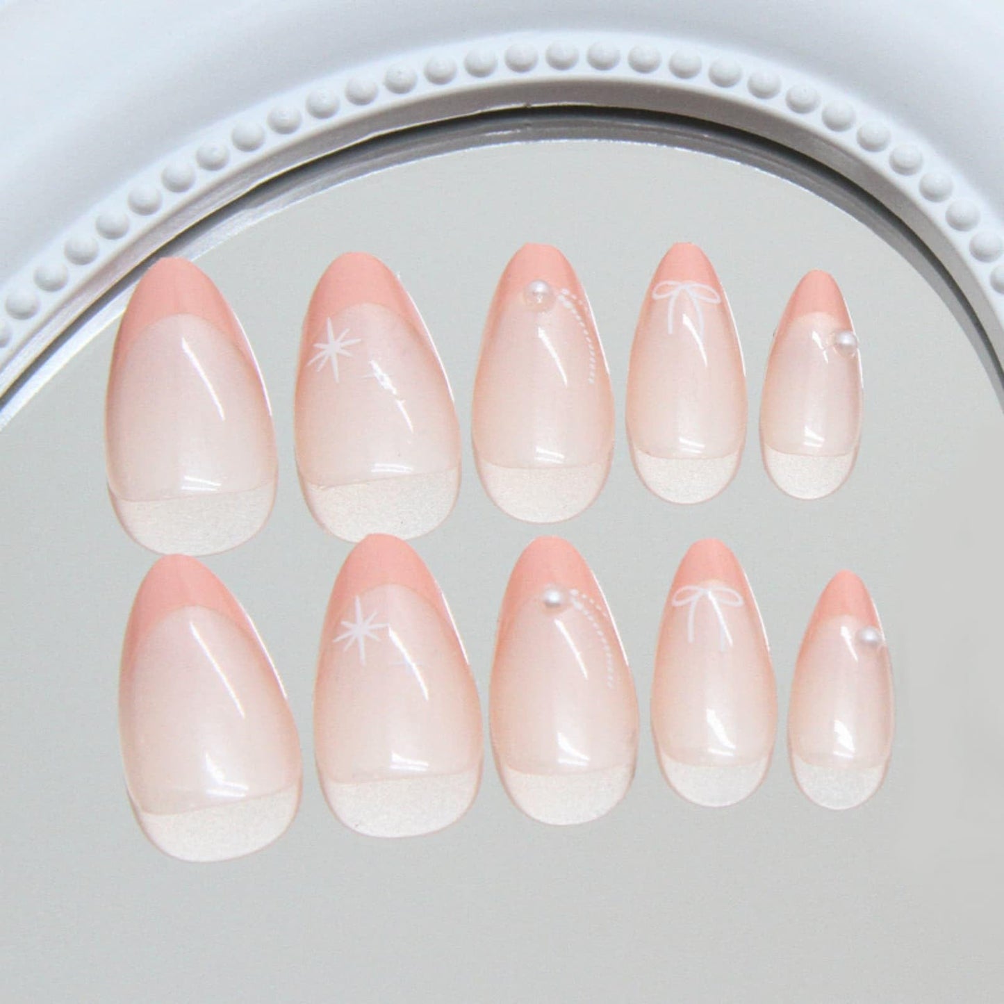 French Press on Nails Short Almond Fake Nails Pink with Bow Starlight Designs Full Cover Acrylic Glue on Nails Removable Artificial Stick on Nails for Women 24 Pcs