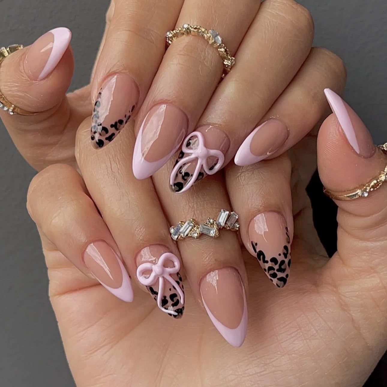 Pink Leopard Print Press on Nails Almond Shaped Fake Nails with 3D Bow Designs Leopard Print Tip Full Cover Stick on Nails Glossy Medium Glue on Nail Reusable Acrylic False Nails for Women 24Pcs