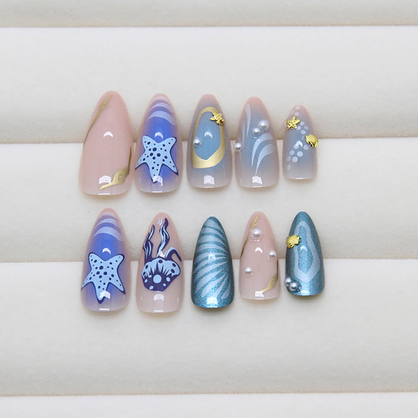 RIICFDD 24 Pcs Medium Press on Nails Almond Shape Fake Nails Blue Nails Press ons Pearl Shell Stick on Nails Starfish Medusa Glue on Nails Full Cover Ocean Theme Acrylic Nails for Women Nail Art