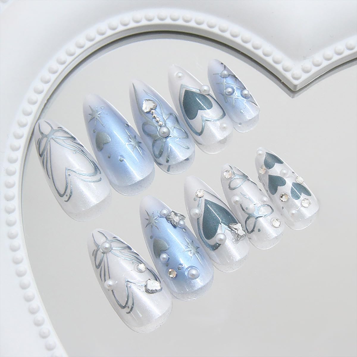 24Pcs Blue Heart Press on Nails Medium Almond Fake Nails with 3D Silver Gems Bow Star Design Cute Butterfly False Nails Full Cover Artificial Glue on Nails Gradient Handmade Stick on Nails for Women