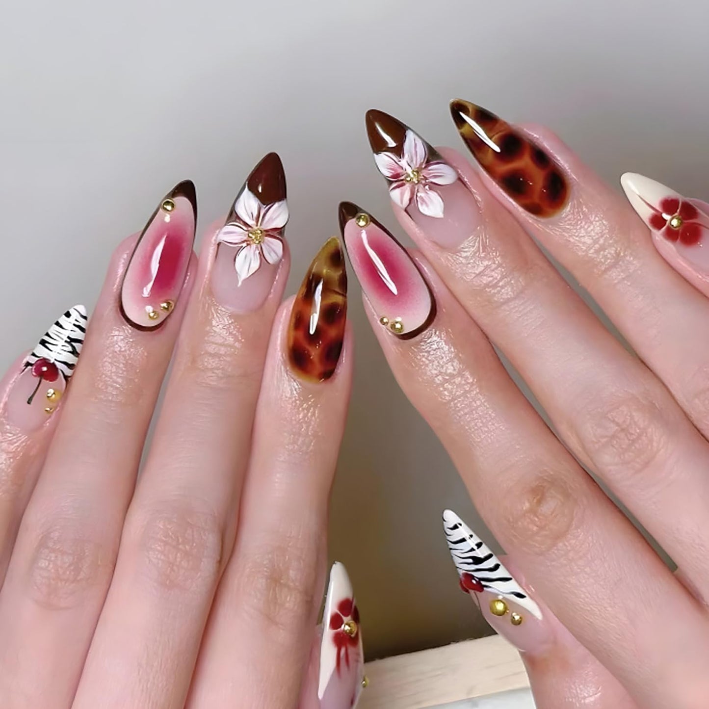 Leopard French Tip Press on Nails Medium Almond Shaped Flower Rhinestones Design Artificial Coffin Nail Full Cover Cherry Stick on Nail Acrylic Press Ons Glossy Glue on Nails for Women 24Pcs