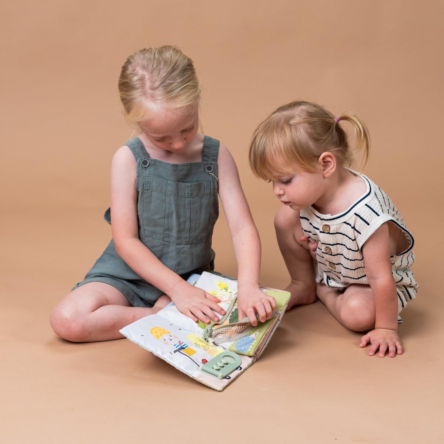 Taf Toys Busy Book for Toddlers 1-3 - Montessori Activity Book with 12 Sensory Learning Activities - Develops Fine Motor Skills and Early Numeracy Through Play