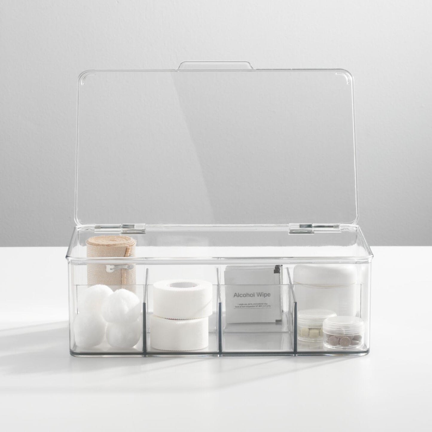 mDesign Plastic First Aid Kit Storage Box with Clear Top Lid for Bathroom, Kitchen, Cabinet, Closet, Drawer - Organizes Medicine, Ointments, Adhesive Bandages, Dental, 8 Divided Sections - Clear