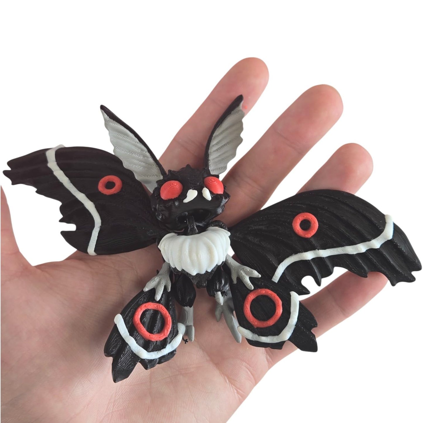 Articulated Twisty Mothman Collectible Figurine - Striking Gothic Design with Black Wings and Red Eyes for Unique Shelf Display - 3D Printed in Canada