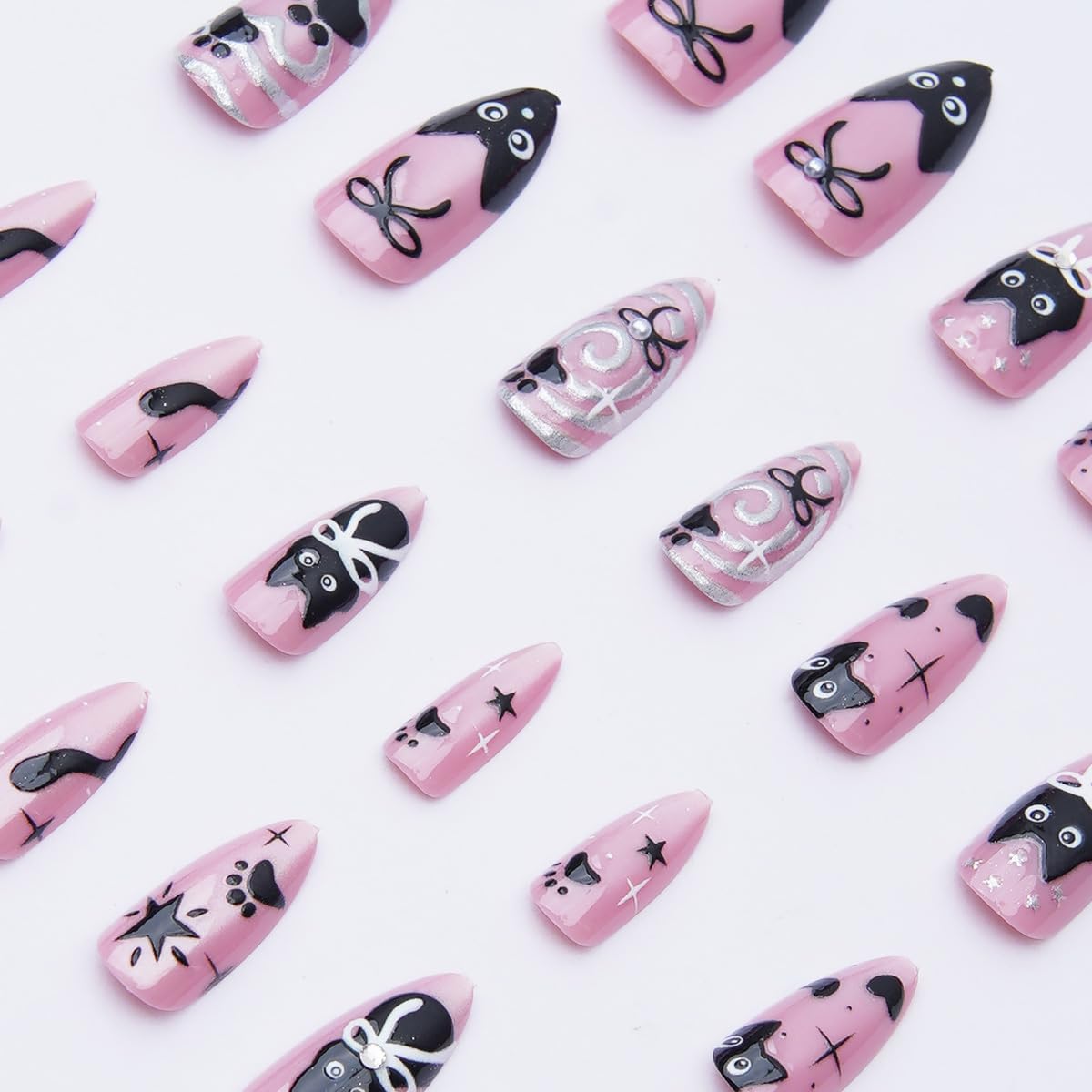 24Pcs Pink Glitter Press on Nails Medium Almond Fake Nails Cute Cat Black Bow Star False Nails with 3D Silvering Heart Vortex Gems Design Full Cover Glue on Nails Artificial Stick on Nail for Women