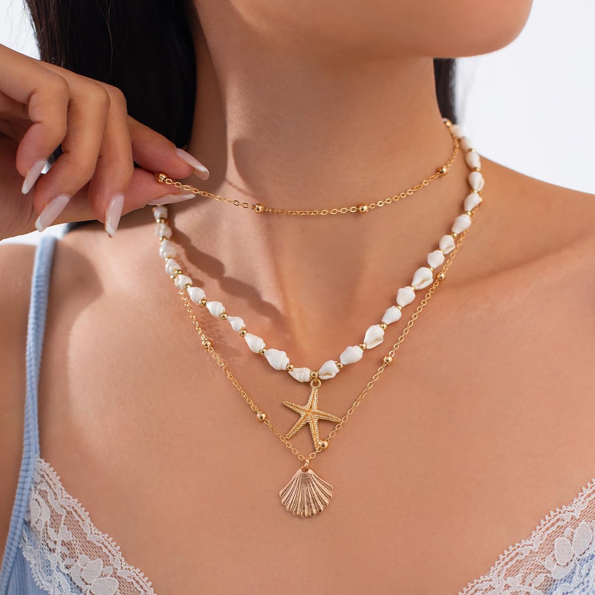 GYRMMUE Gold Starfish Necklaces for Women Boho Seashell Pendant Layered Necklaces Set Dainty Ocean Beach Charm Necklace Hawaiian Shell Stackable Beaded Necklace Summer Vacation Jewelry (White)