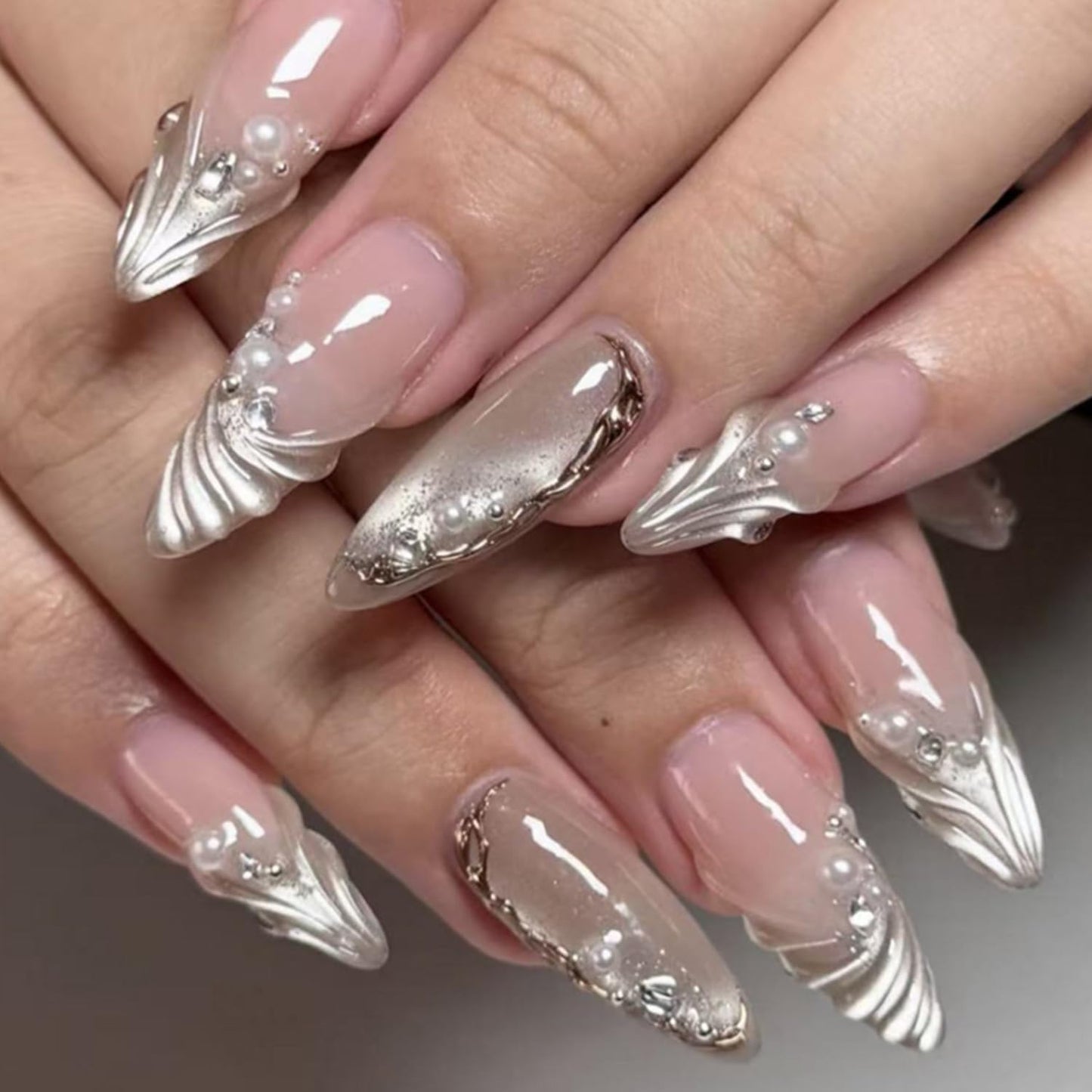 Press on Nails Medium Length Artificial Acrylic French Silver Irregular Lines 3D Ripple with Rhinestones Pearl Design Glitter Almond Glue on Stick on Nail Artificial Fingernails for Women Manicure
