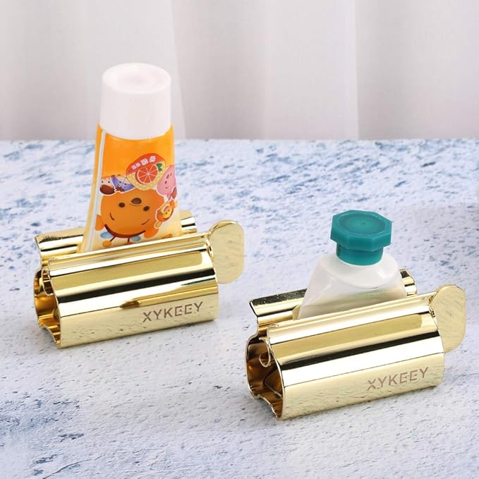 XYKEEY Toothpaste Tube Squeezer - Set of 2 Toothpaste Squeezer Rollers, Metal Toothpaste Tube Wringer Seat Holder Stand (Gold)