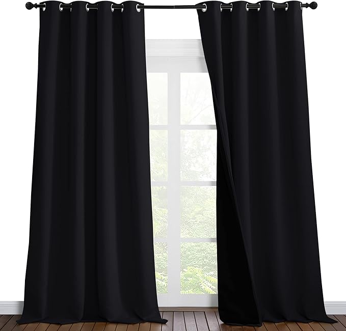 NICETOWN Cold Blocking 100% Blackout Curtains, Durable Black Lined Blackout Curtains for Bedroom, Energy Saving Long Curtains for Patio Sliding Glass Door, Black, 55 inches x 96 inches, 2 Panels