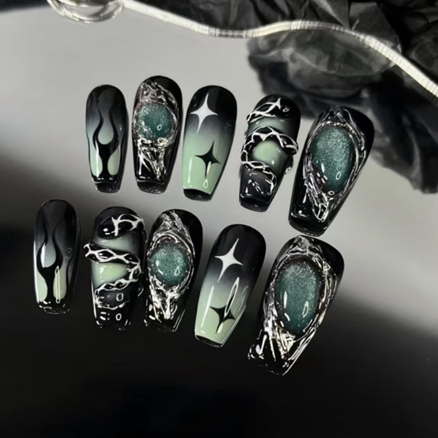 24Pcs Gothic Press on Nails Medium Coffin Fake Nails 3D Y2K False Nail with Star Irregular Silver Designs Black Green Gradient Glue on Nails Silver Metal Nail Tips Full Cover Dark Stick on Nail Set