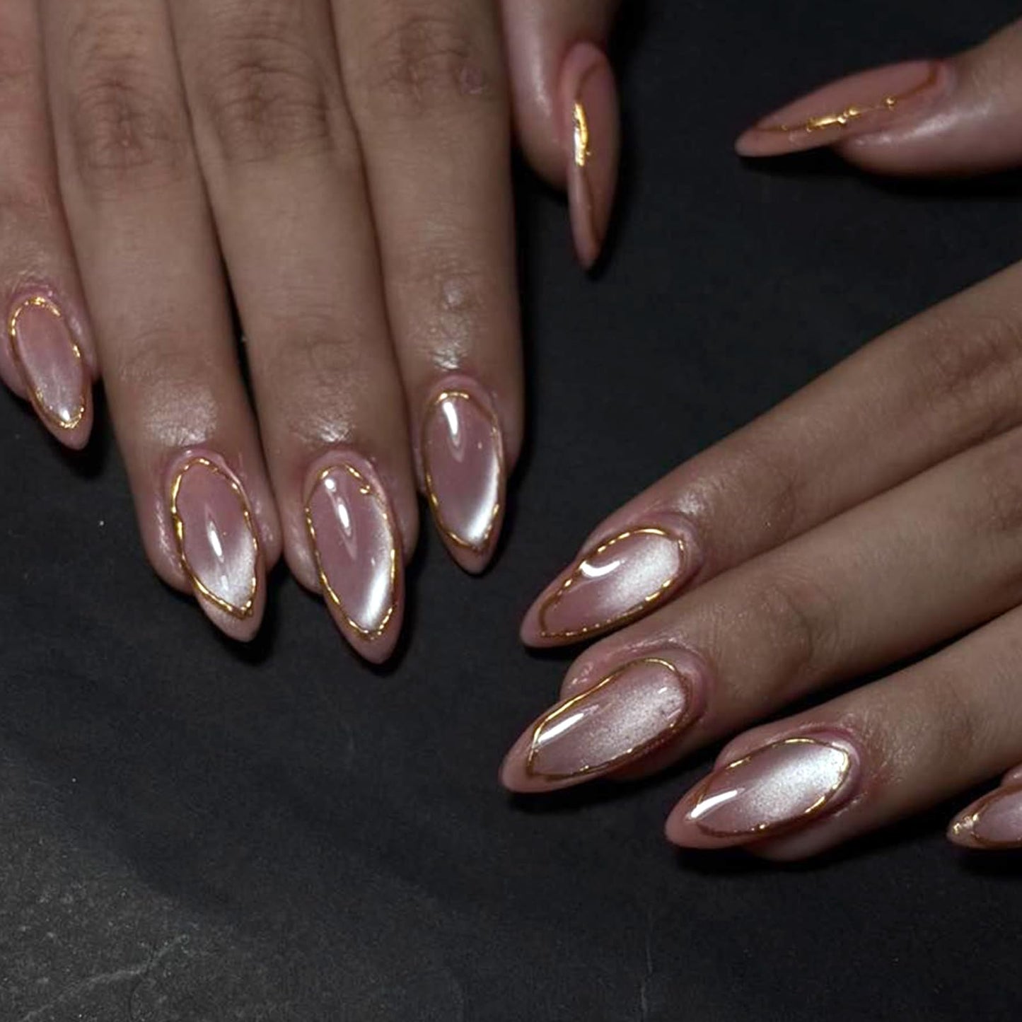 VOTACOS Cat Eye Acrylic Press on Nails Almond Medium Light Pink Acrylic Fake Nails Press Ons with Designs Gold Glue on Nail for Women 24PCS Reusable Artificial Stick on False Nail with 3D Line Designs
