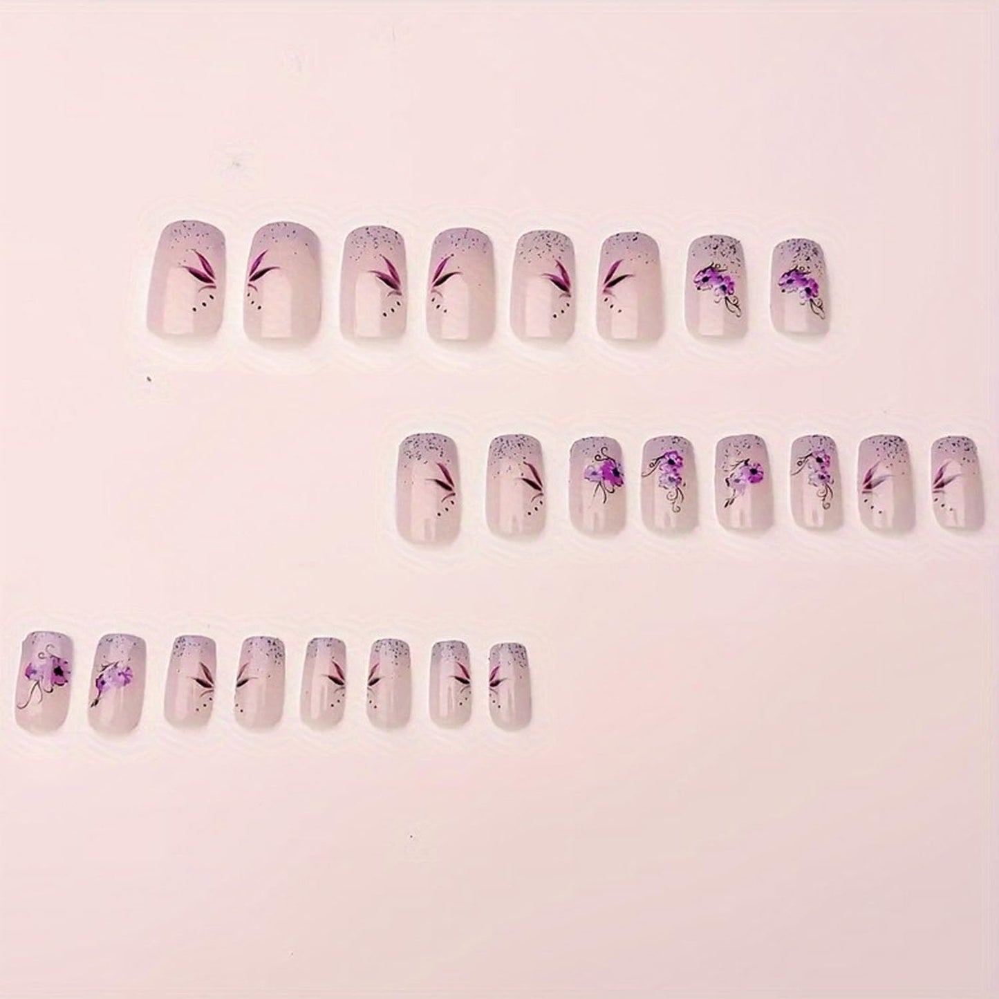 French Press on Nails Medium Short Fake Nails with Glitter Designs Purple Flowers Glue on Nails Translucent Nails Press ons Spring False Nails for Women 24 Pcs