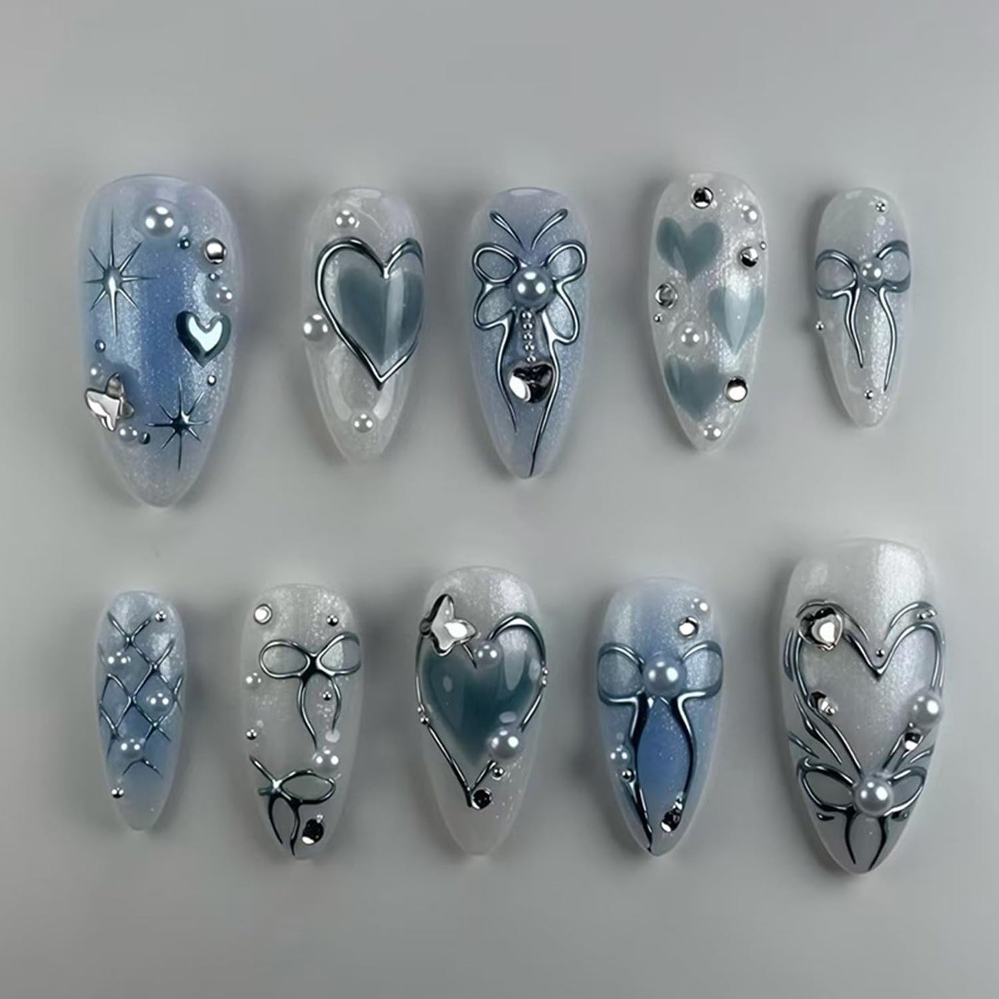 24Pcs Blue Almond Press on Nails Medium Fake Nails 3D Heart Glue on Nail Heart Bow Acrylic Nail Star Pearl Rhinestones Charms Gradient Blue White False Nails for Women Manicure Decoration