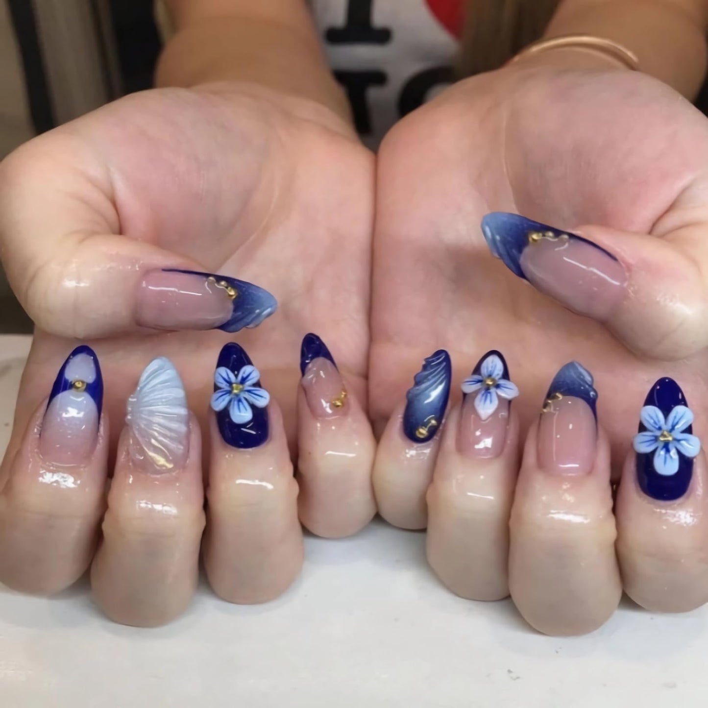 MISUD Press on Nails - Medium Almond Fake Nails with Navy Blue, Acrylic Handmade 3D Flower Gel Design 24 pcs