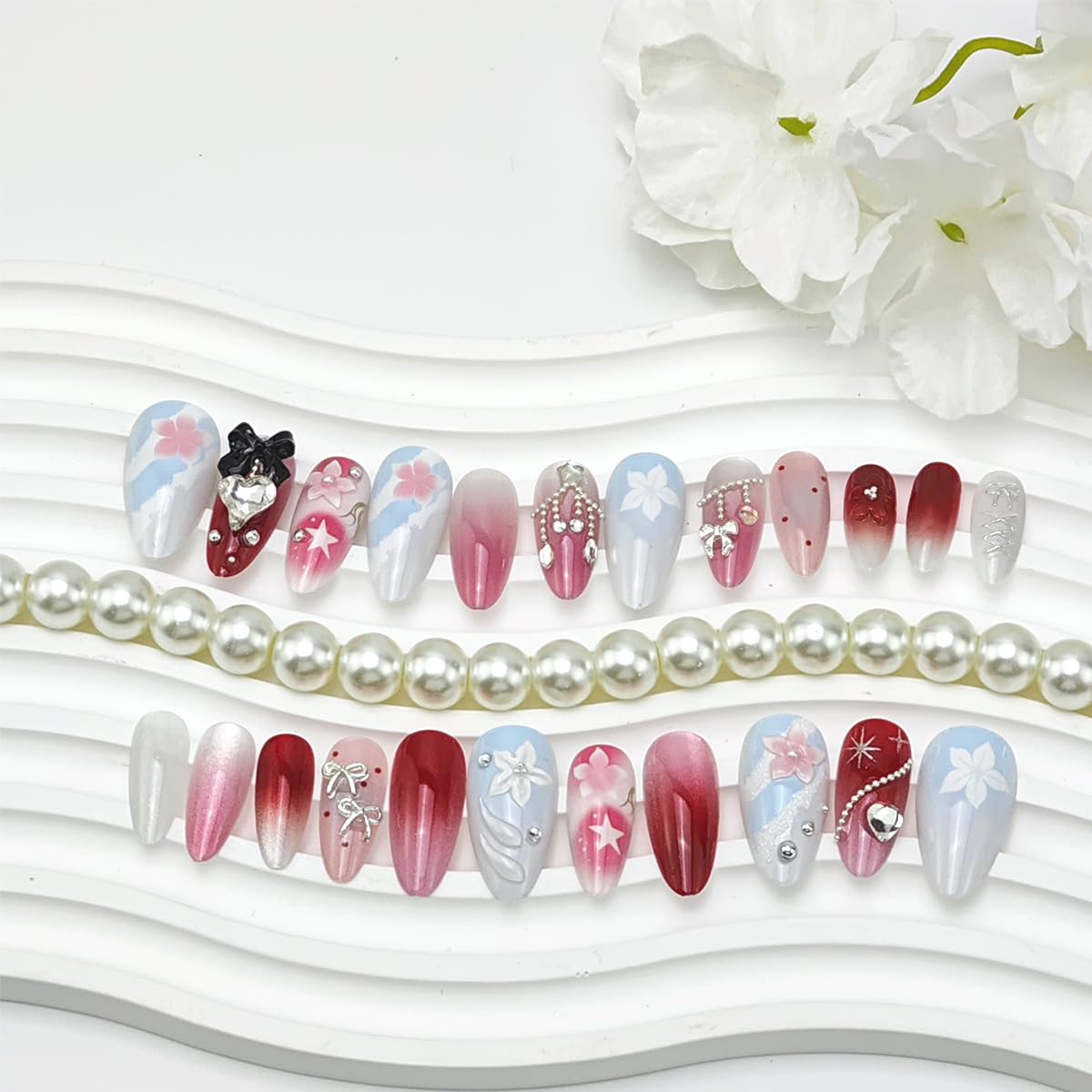 24Pcs Valentines Press on Nails Medium Almond Fake Nails with 3D Black Bow Pearl Rhinestones Designs Cute Heart False Nails Pink Flowers Full Cover Acrylic Stick on Nail for Women DIY Manicure Decor