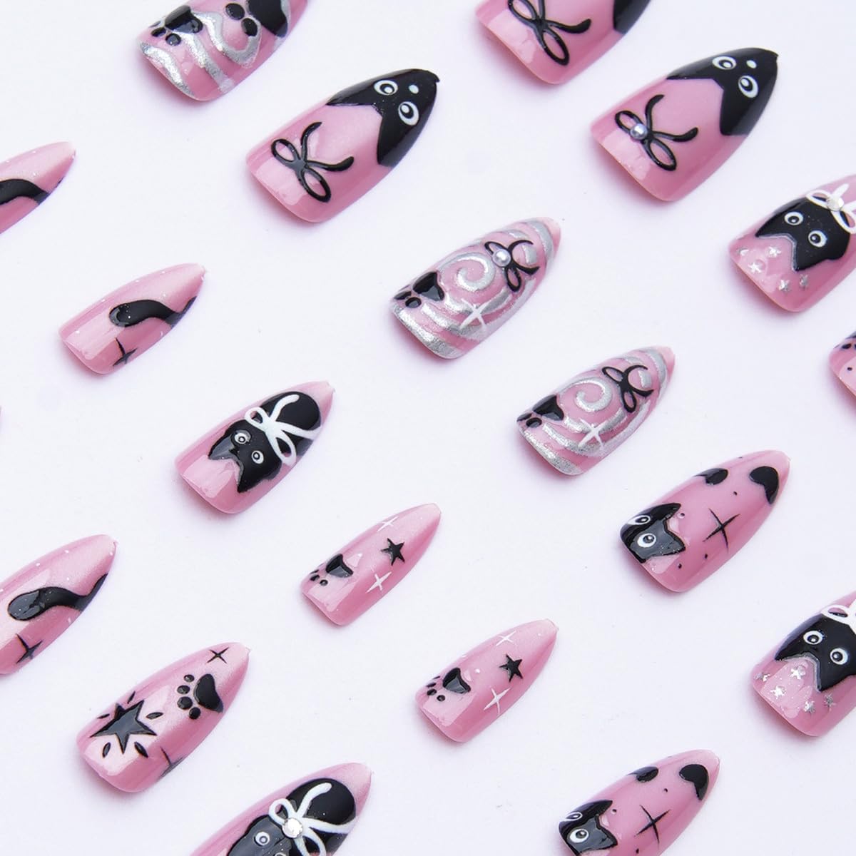 24Pcs Pink Press on Nails Medium Almond Cute Cat Fake Nails with Black Cat Bow Pearl Design Glossy Full Cover Acrylic Glue on Nail Silver Heart False Nails Artificial Reusable Stick on Nail for Women
