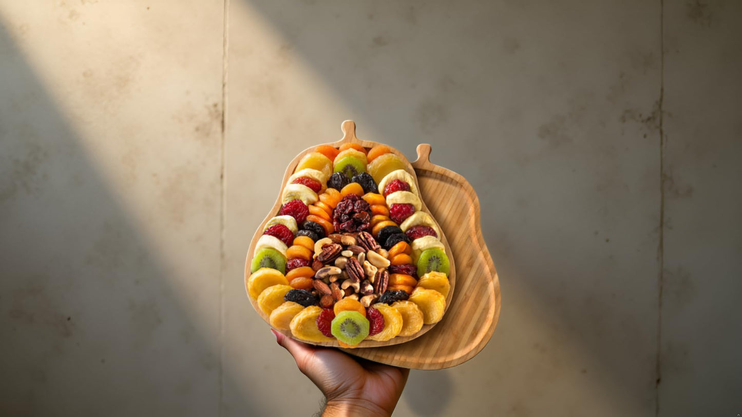 A Gift Inside Festive Dried Fruit and Nuts on Bamboo Pear Shaped Cutting Board