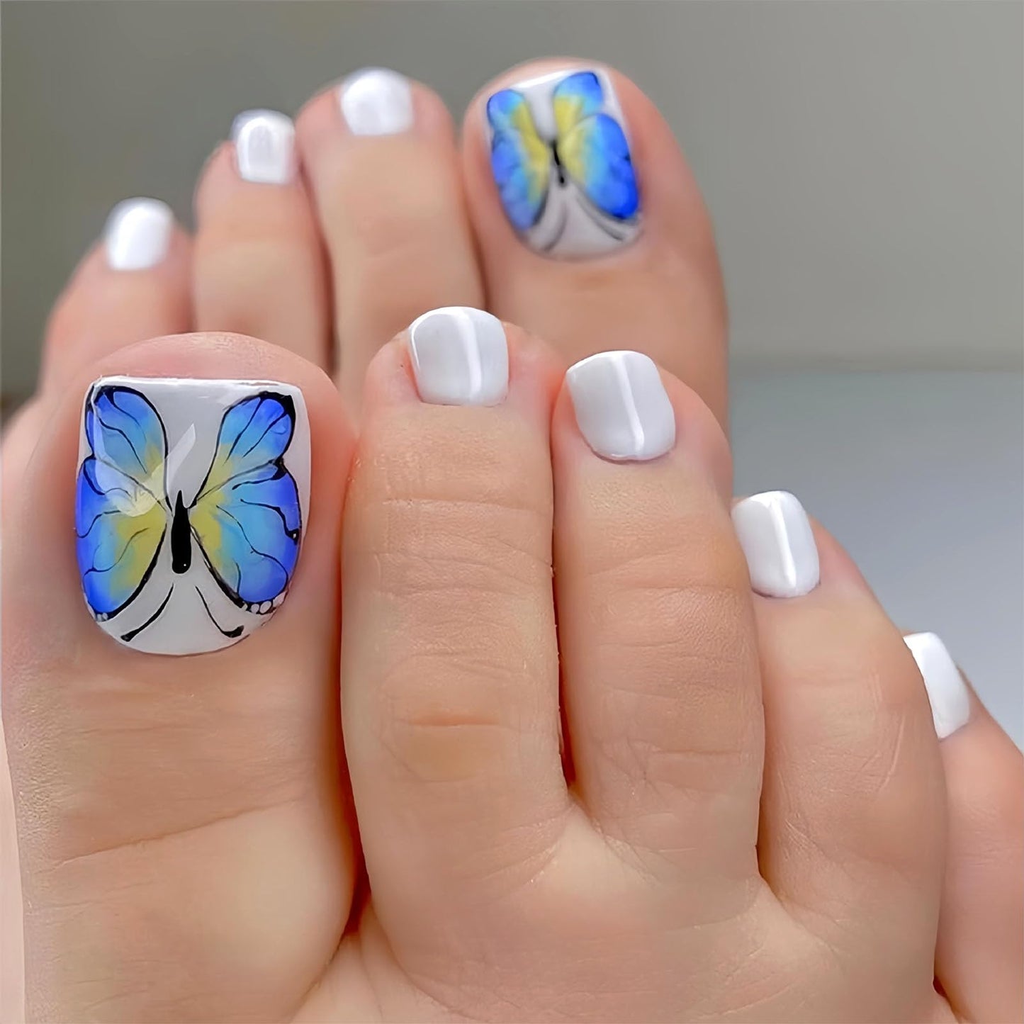 Spring Press on Toenails White Fake Toe nails with Blue Butterfly Design Glossy Short Square Toe nails Press ons Acrylic Stick on Toenails for Women 24Pcs