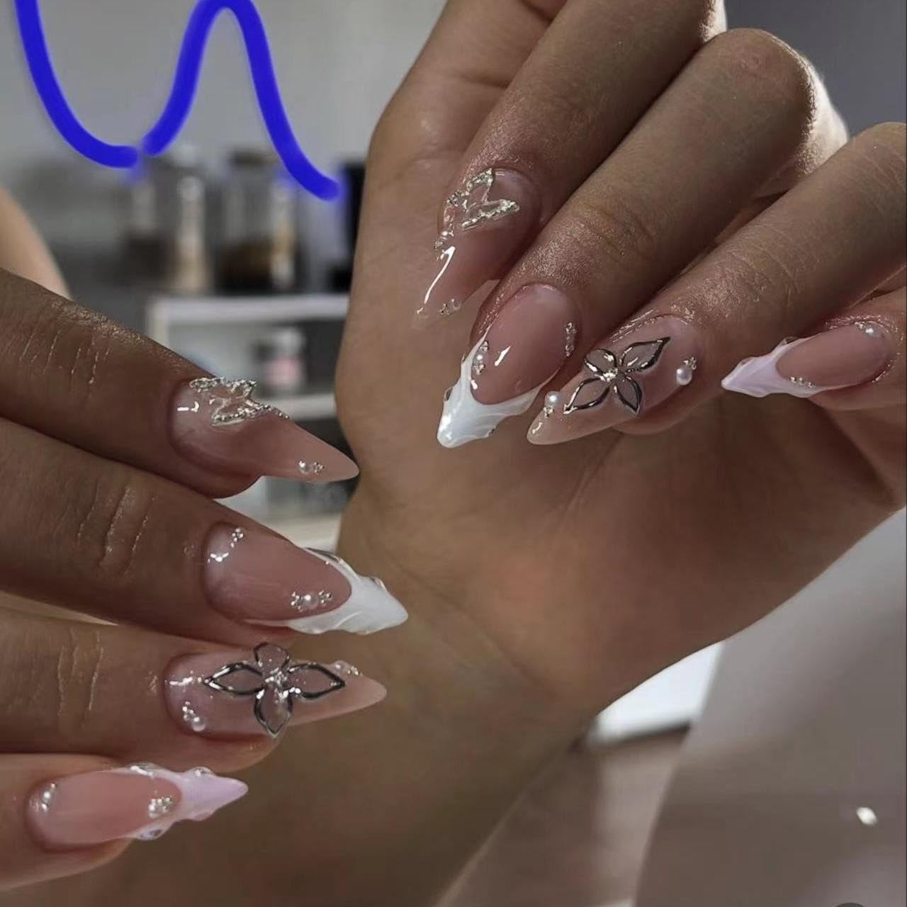 24PCS Medium Almond Press-On Nails Set - Nude Pink Gel Fake Nails with 3D Silver Flower Pearl & Butterfly Decor False Nails Reusable Adhesive Spring Summer Glue Stick-On Nail for Women Salon Look