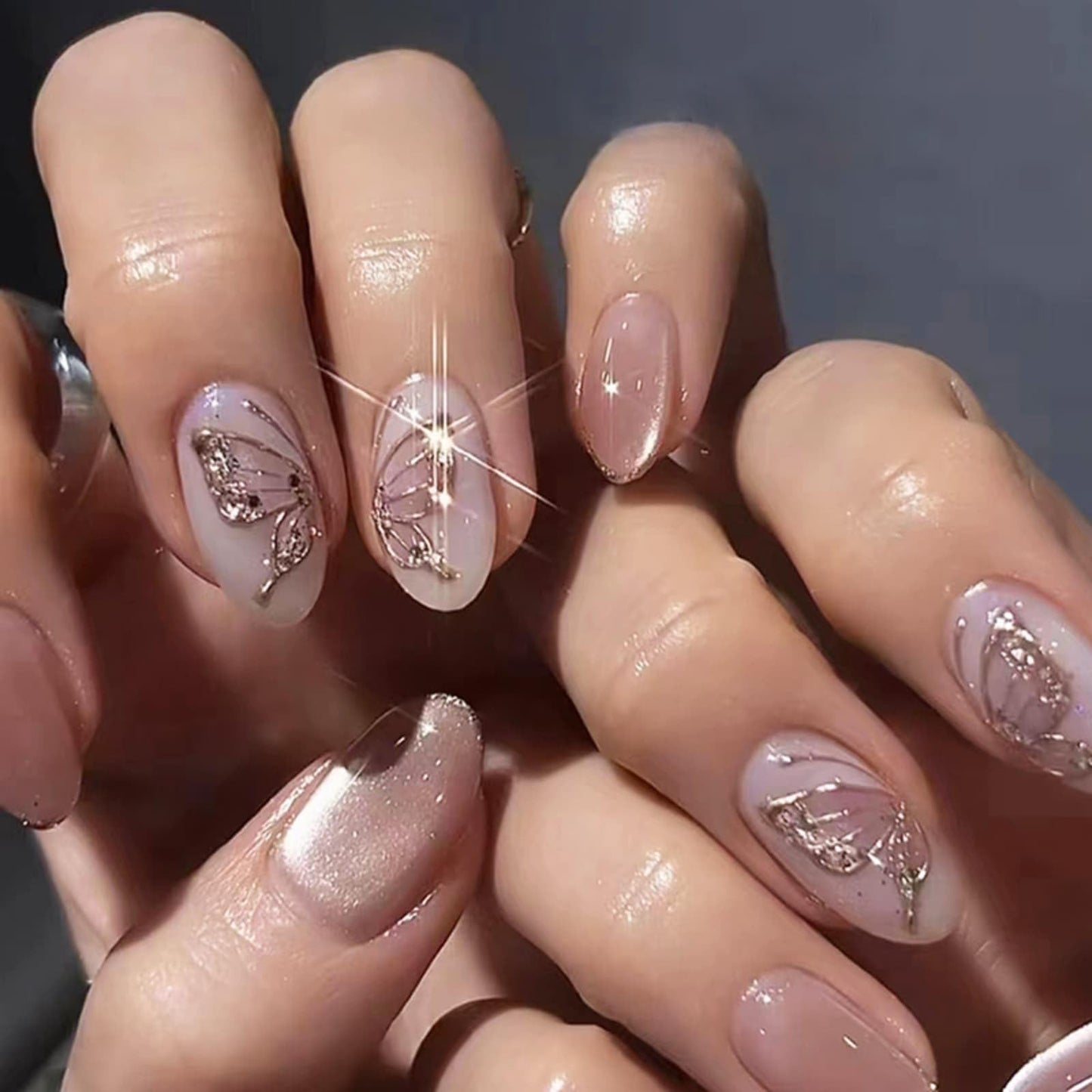Short Almond Press on Nails Sparkly Butterfly Fake Nails Nude Pink with Butterfly Glitter Design Glossy Full Cover Acrylic Nails Reusable Stick on Nails Glossy Artificial Nails for Women