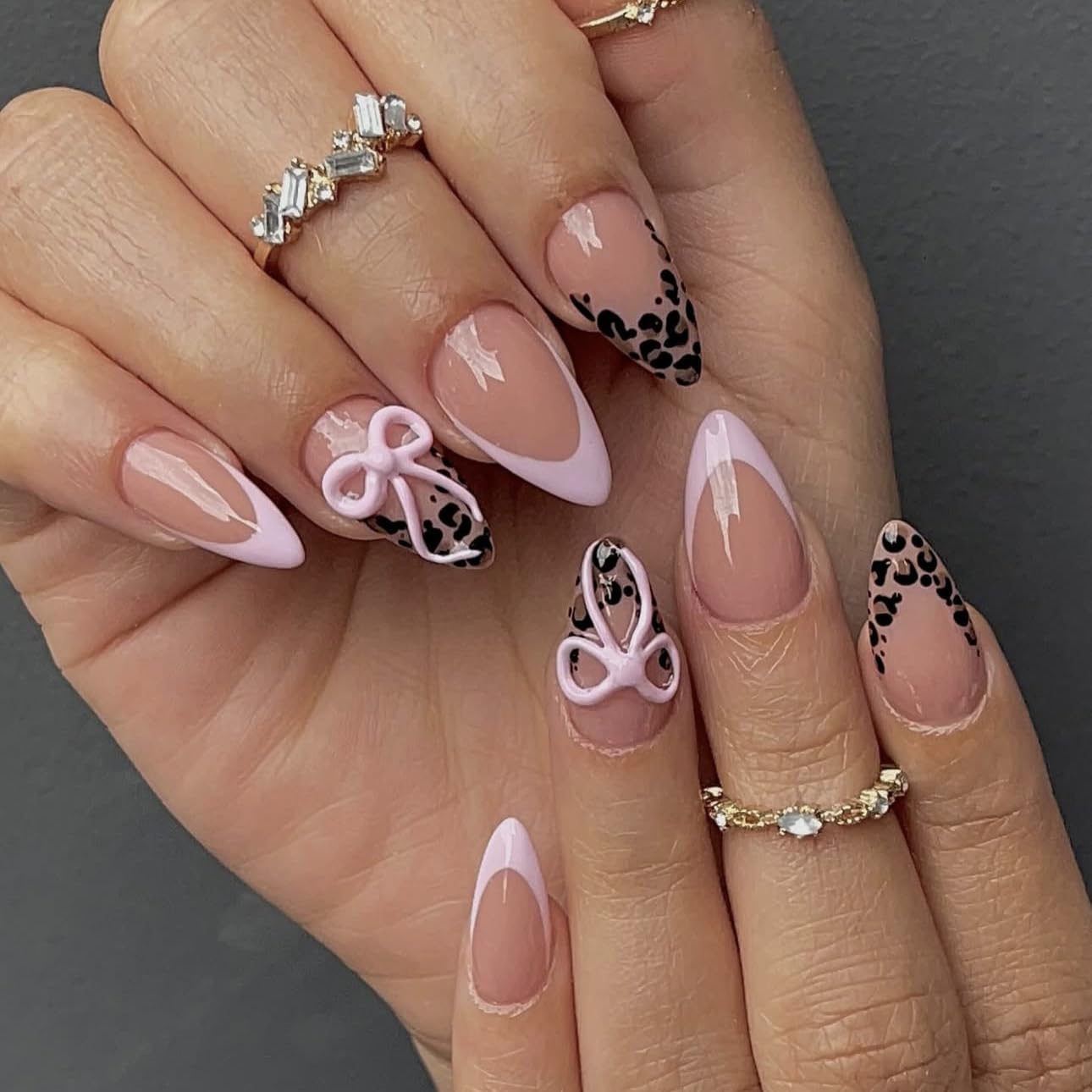Pink Leopard Print Press on Nails Almond Shaped Fake Nails with 3D Bow Designs Leopard Print Tip Full Cover Stick on Nails Glossy Medium Glue on Nail Reusable Acrylic False Nails for Women 24Pcs