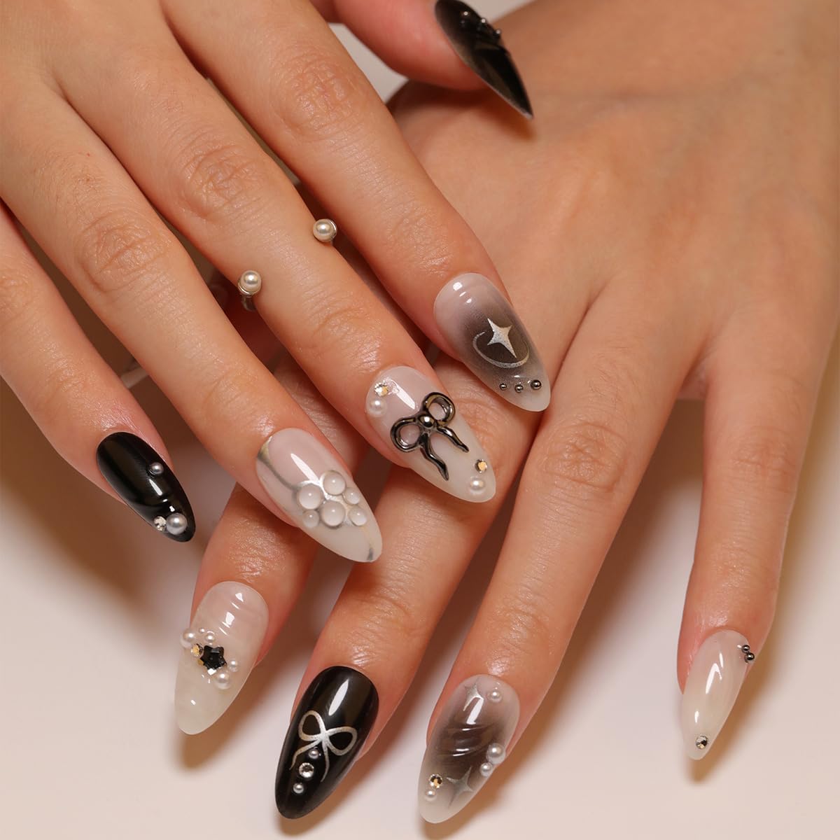 24Pcs Black Press on Nails Medium Almond Fake Nails 3D Silver Bow Pearl Star Glitter Design Full Cover Stick on Nails Artificial Nails Gothic False Nails Y2k Glue on Nails for Women Acrylic Nails